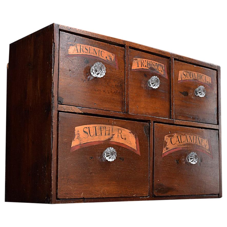 19th century pine apothecary draws
We are proud to offer a highly decorative 19th century English hand-crafted set of apothecary draws. With all original glass knobs and gold gilt hand painted labels still present. The draws are all finished with