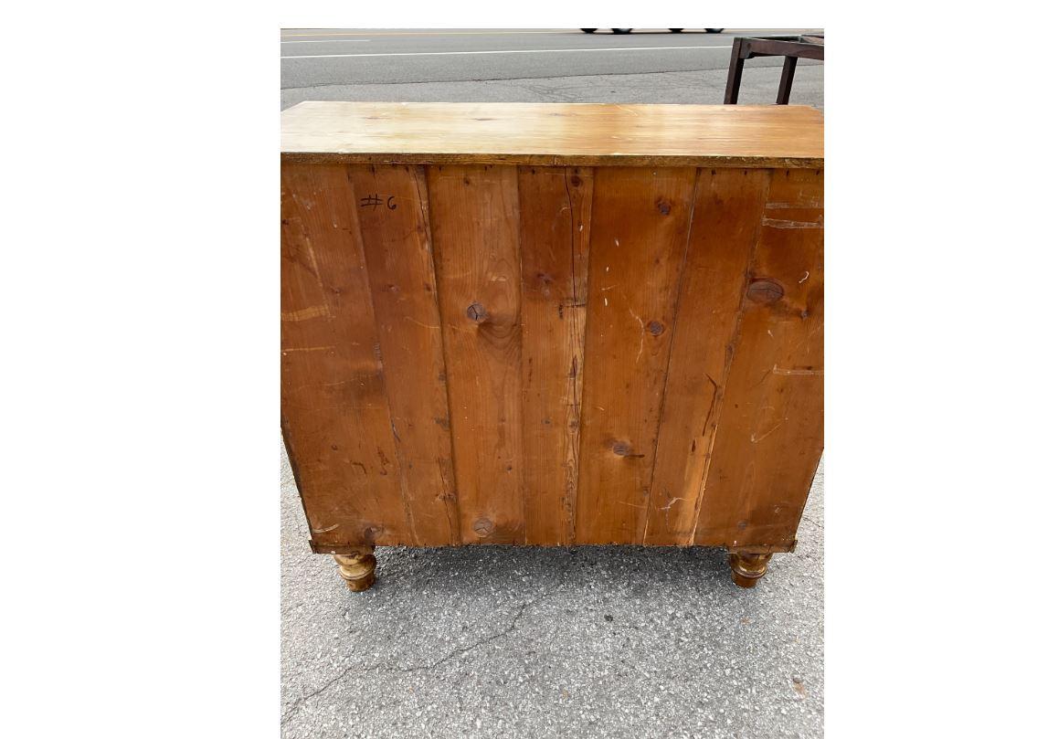 This is a beautiful little 19th Century English Pine chest from the Victorian period. Featuring 2 small drawers over 2 larger drawers original pulls and perfect feet. The patina and warm tone makes this a great piece for many areas of the home,