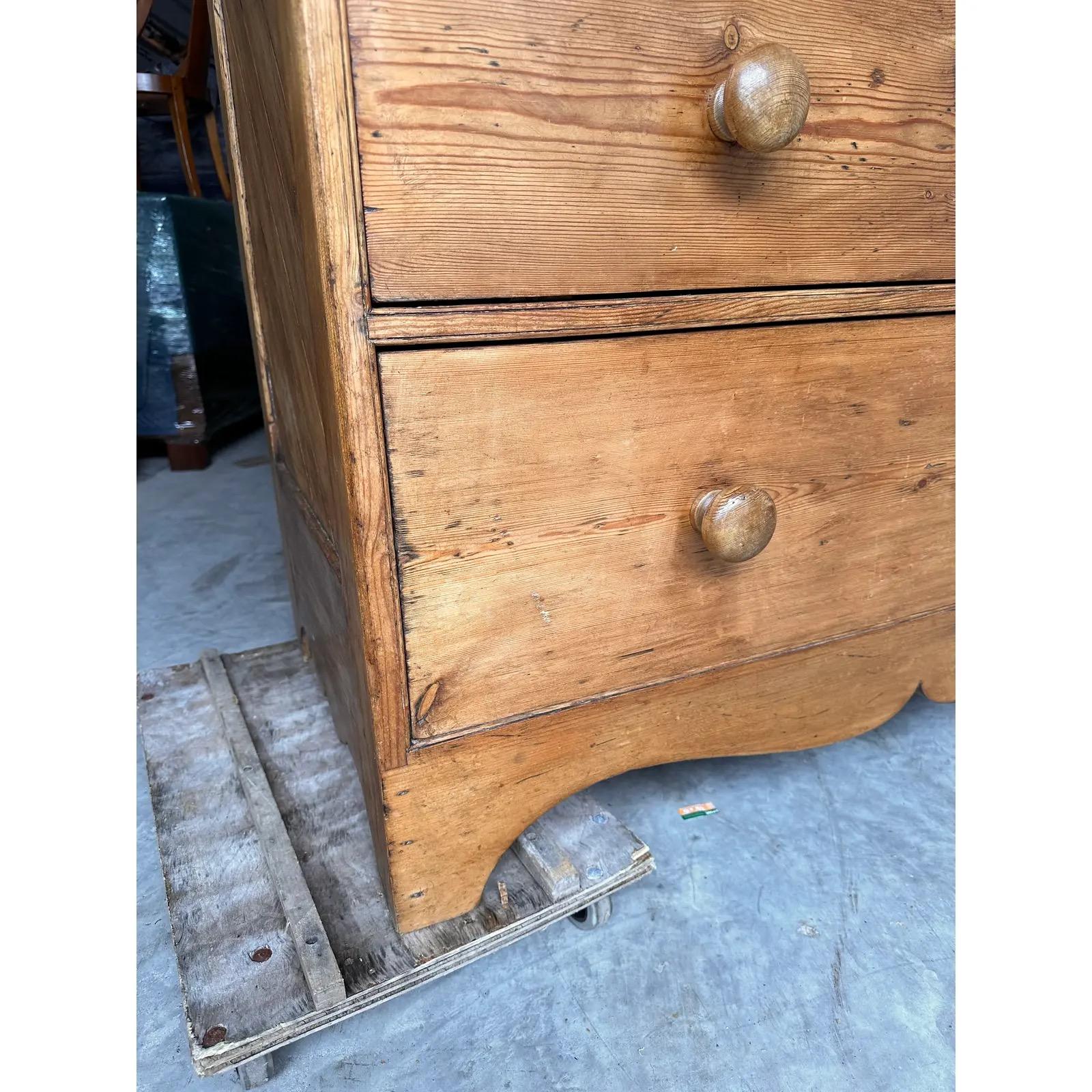 This is a lovely antique Two over three English pine chest! Larger in size than normal this piece has a real presence noticed the sides they're so unusual I've never seen this on an English pine chest.This piece dates to the 19th century and has