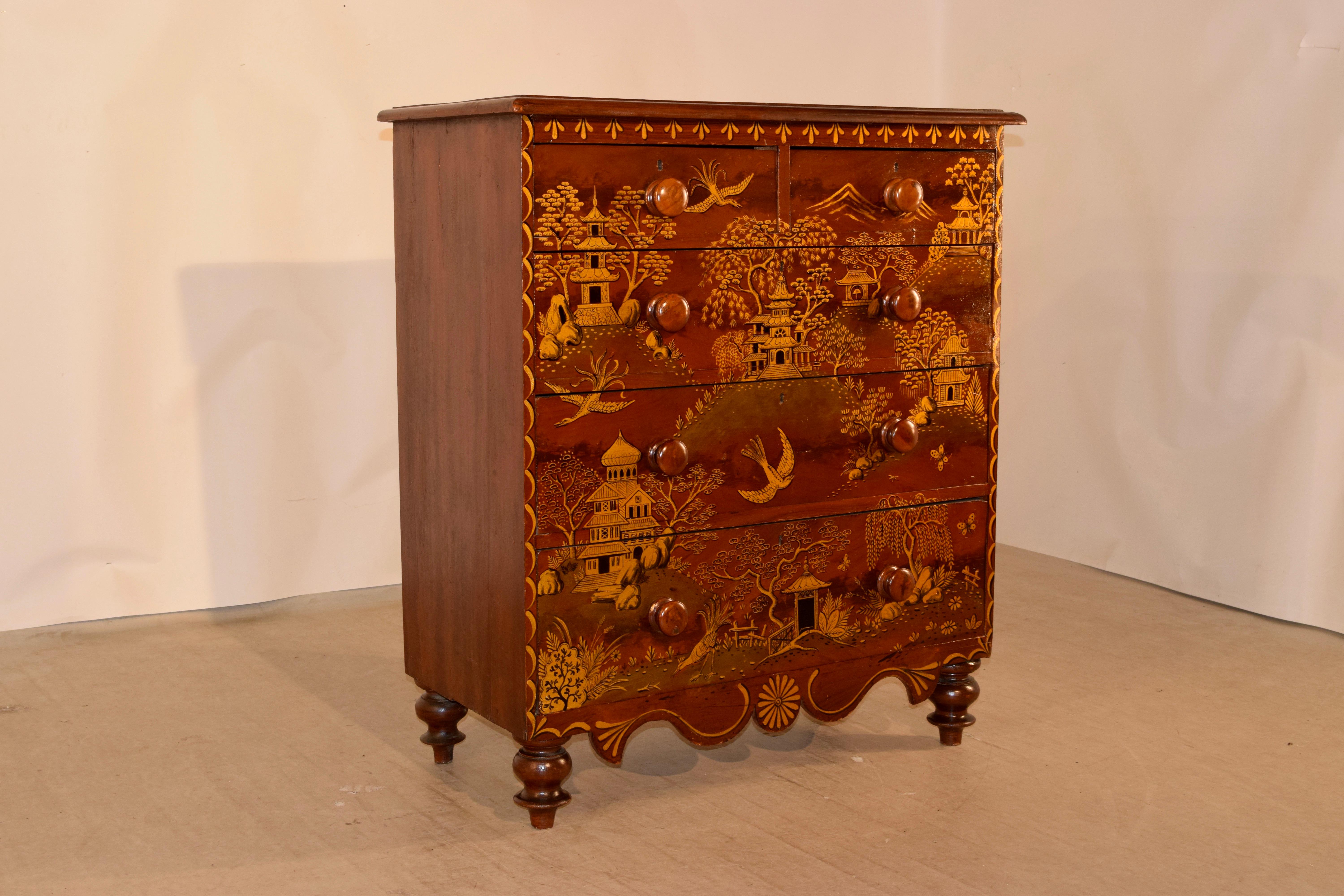 19th century pine chest of drawers from England with a beveled edge around the top, following down to two over three-drawer configuration. The front of the piece is hand painted with wonderful chinoiserie decoration. The sides are simple and the