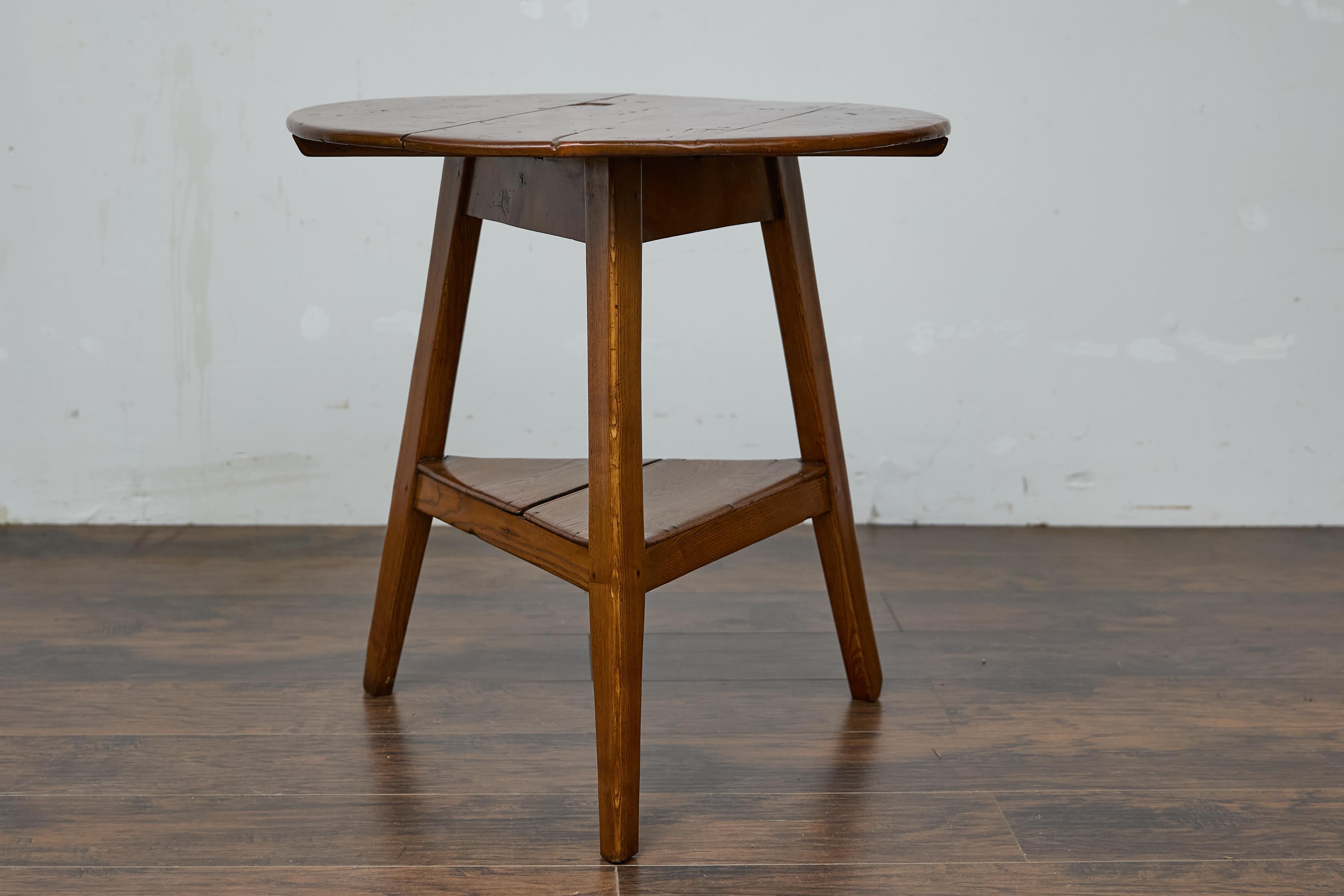 19th Century English Pine Cricket Table with Tripod Base, Round Top, and Shelf 7