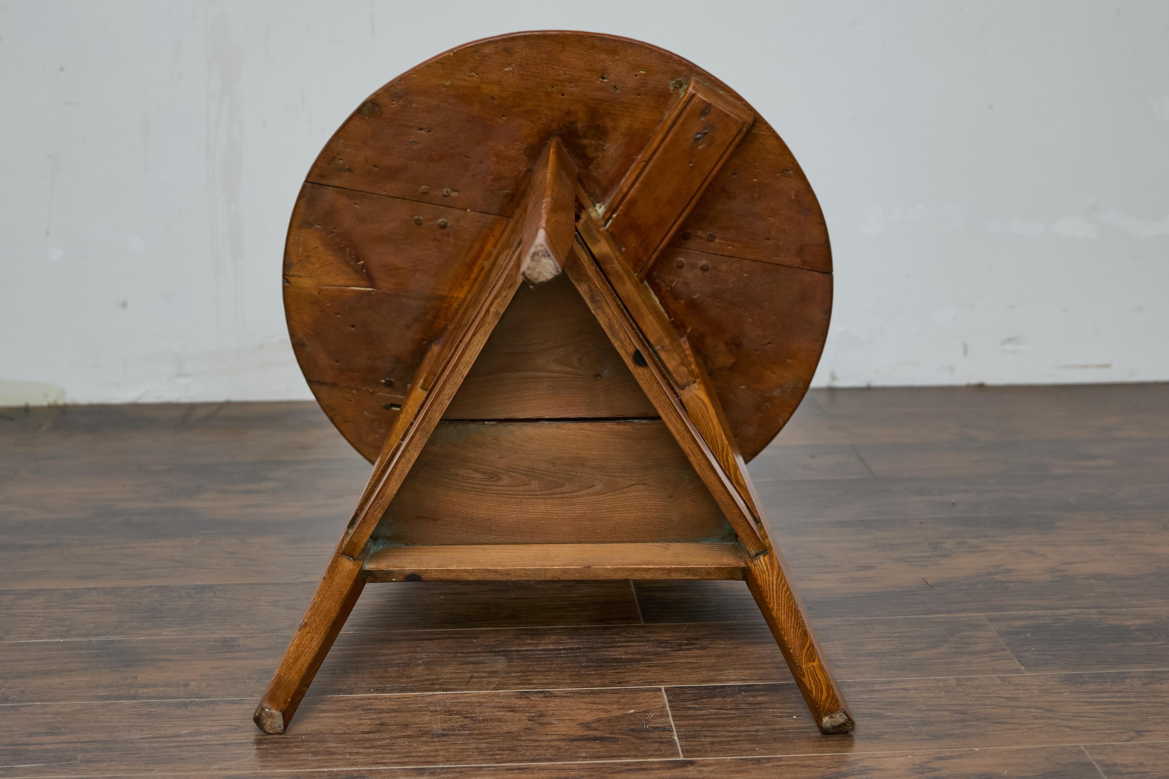 19th Century English Pine Cricket Table with Tripod Base, Round Top, and Shelf 9