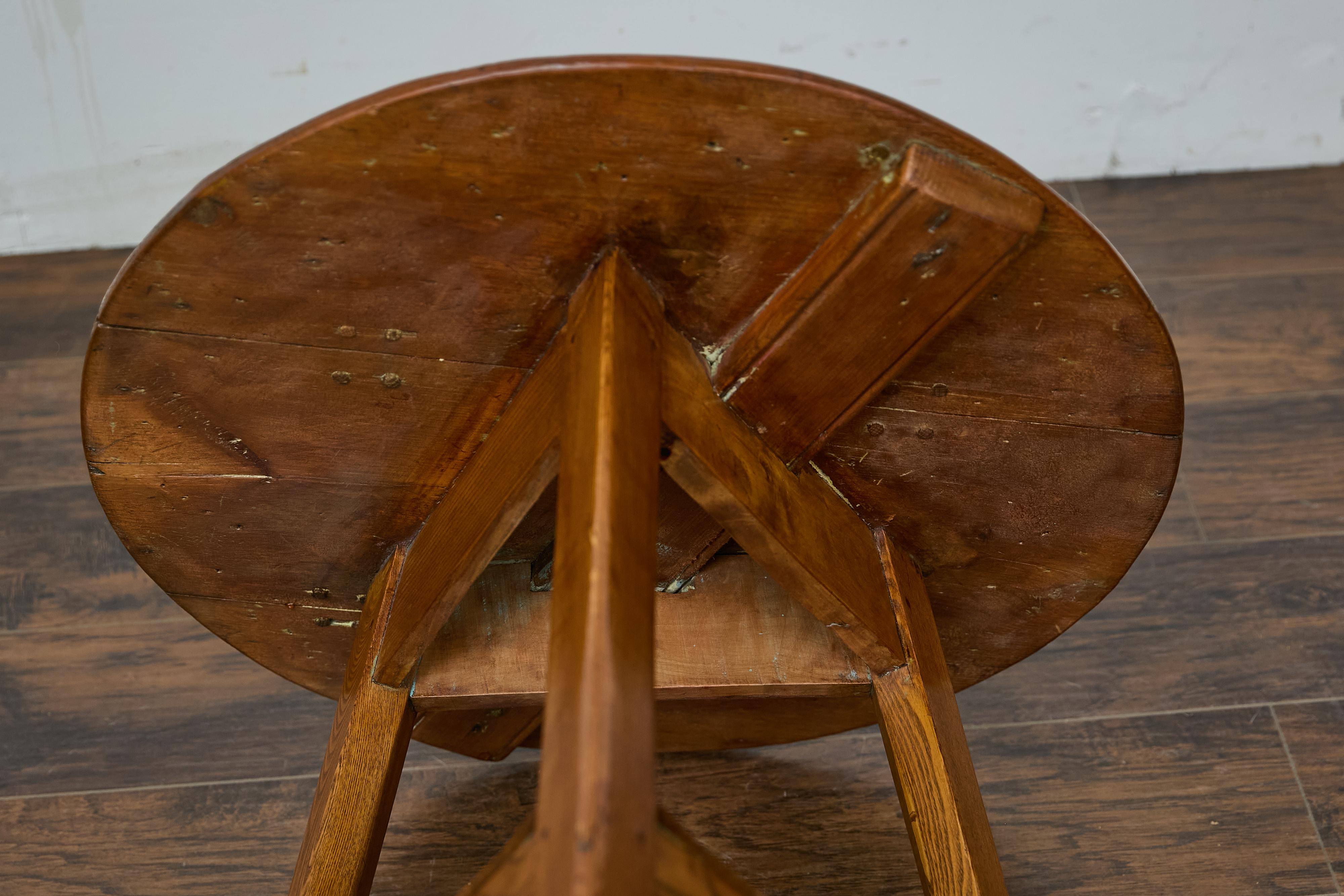 19th Century English Pine Cricket Table with Tripod Base, Round Top, and Shelf 10