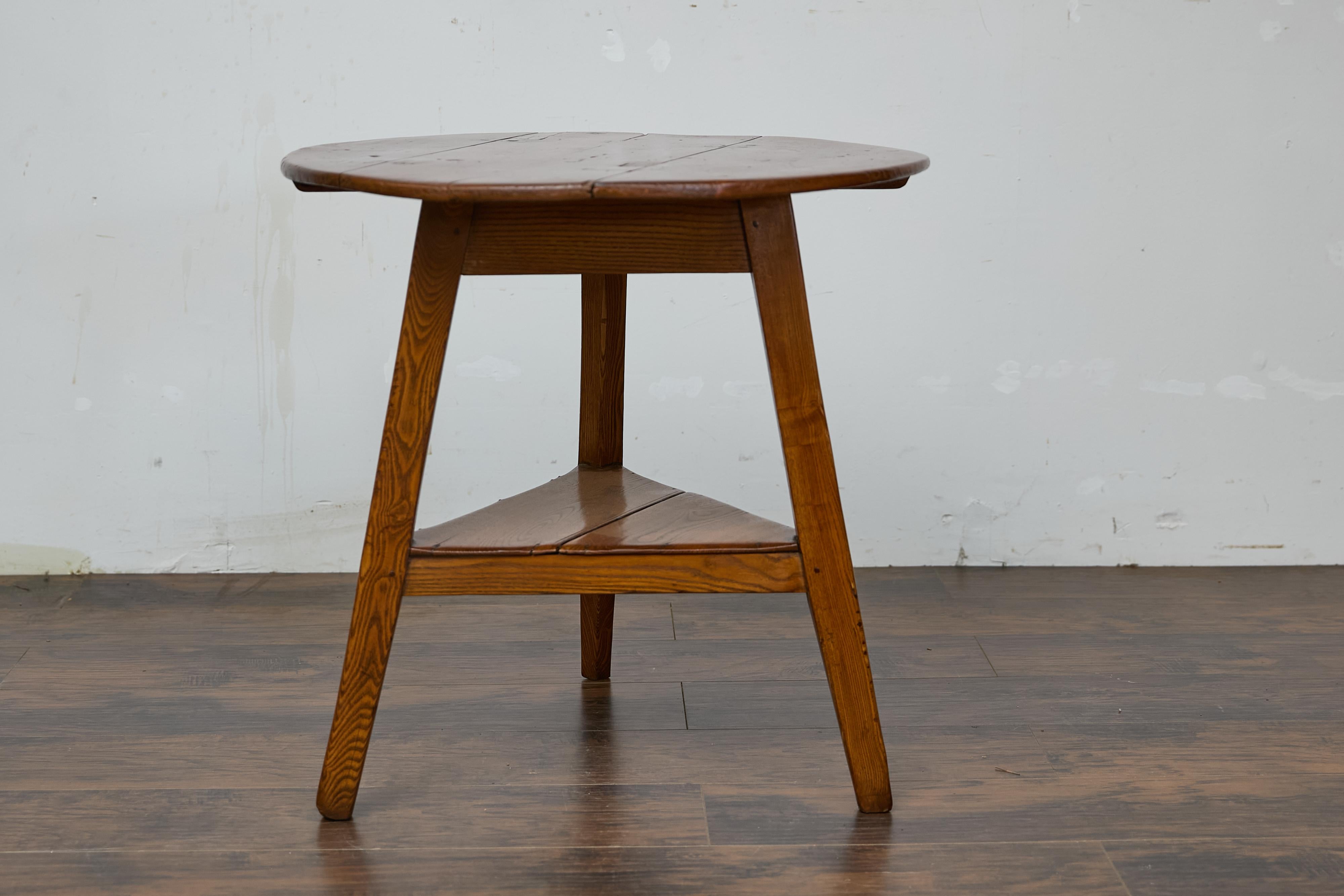 19th Century English Pine Cricket Table with Tripod Base, Round Top, and Shelf 14