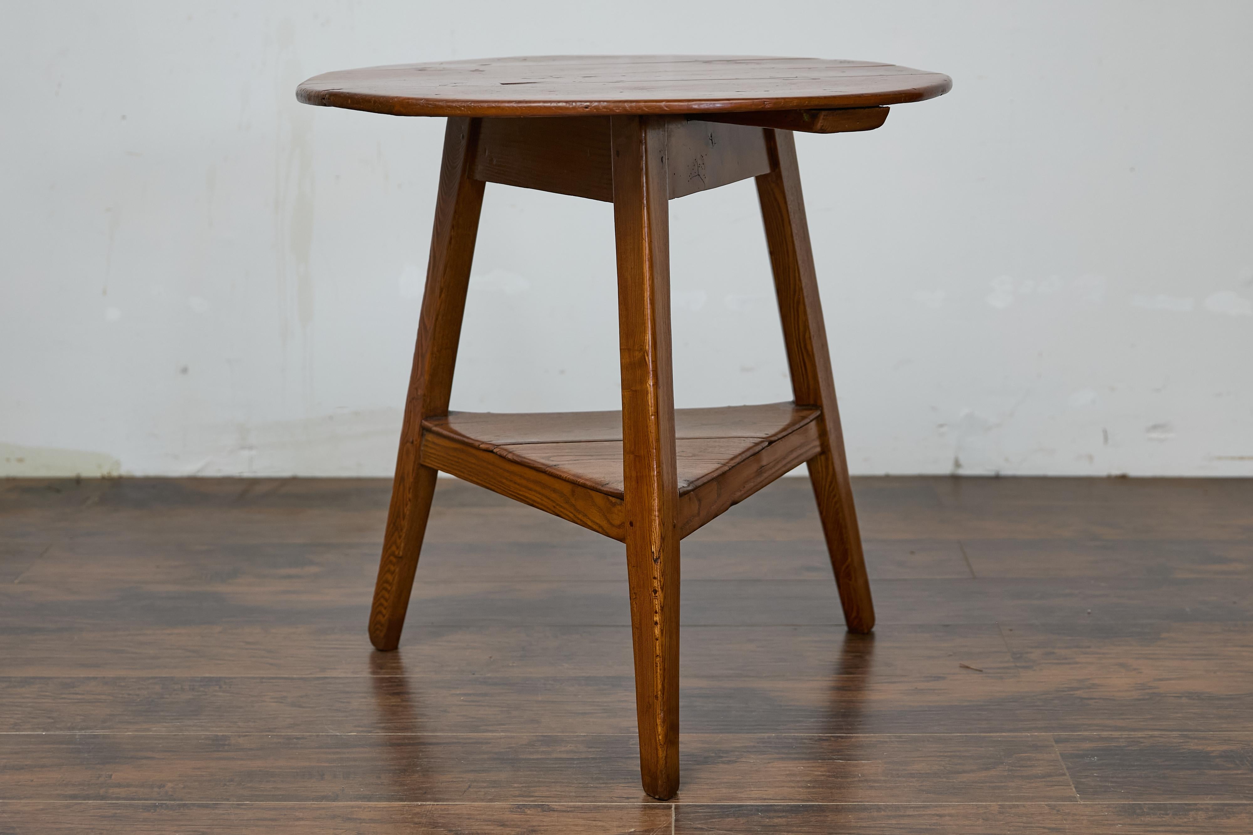 19th Century English Pine Cricket Table with Tripod Base, Round Top, and Shelf In Good Condition In Atlanta, GA