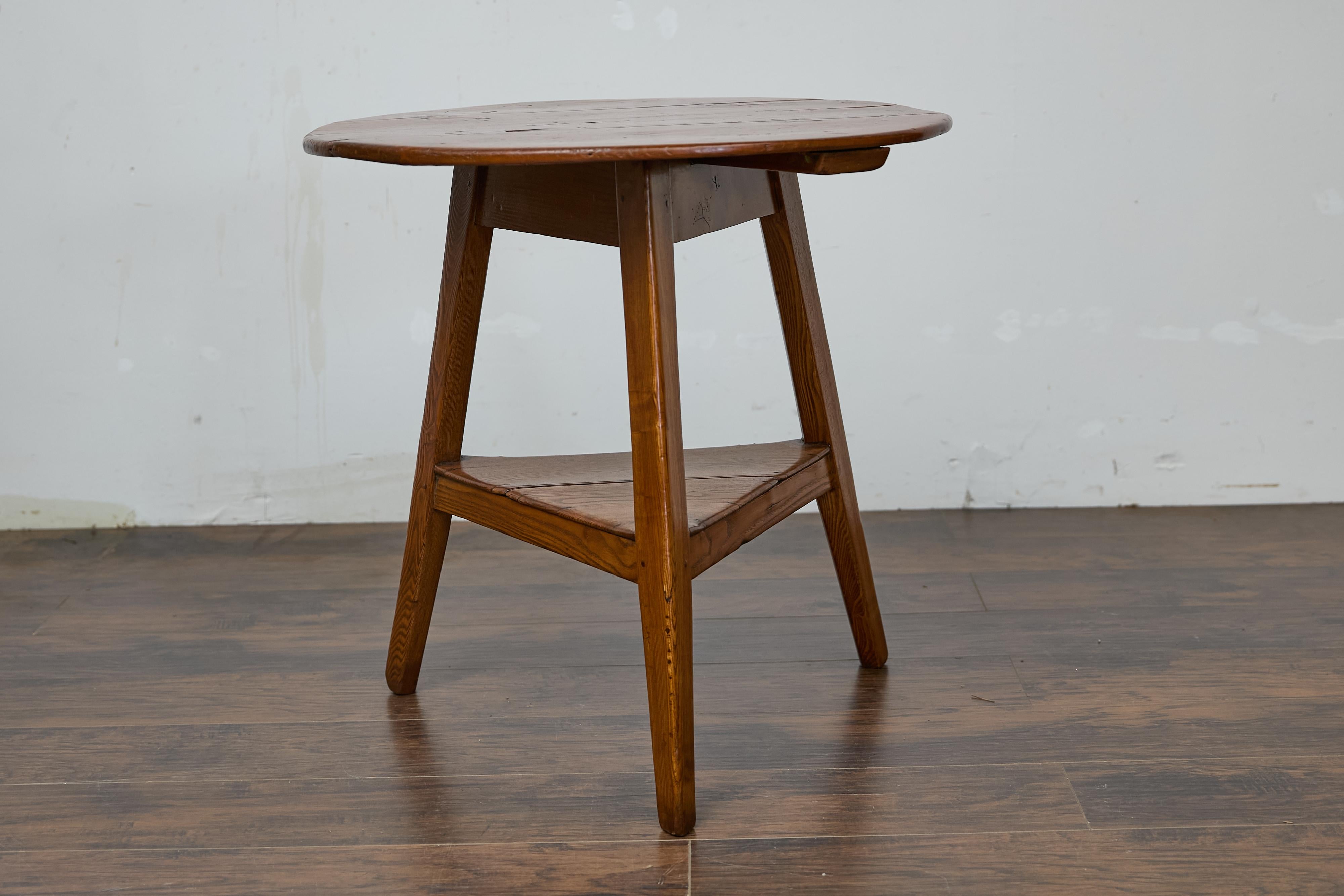 19th Century English Pine Cricket Table with Tripod Base, Round Top, and Shelf 3