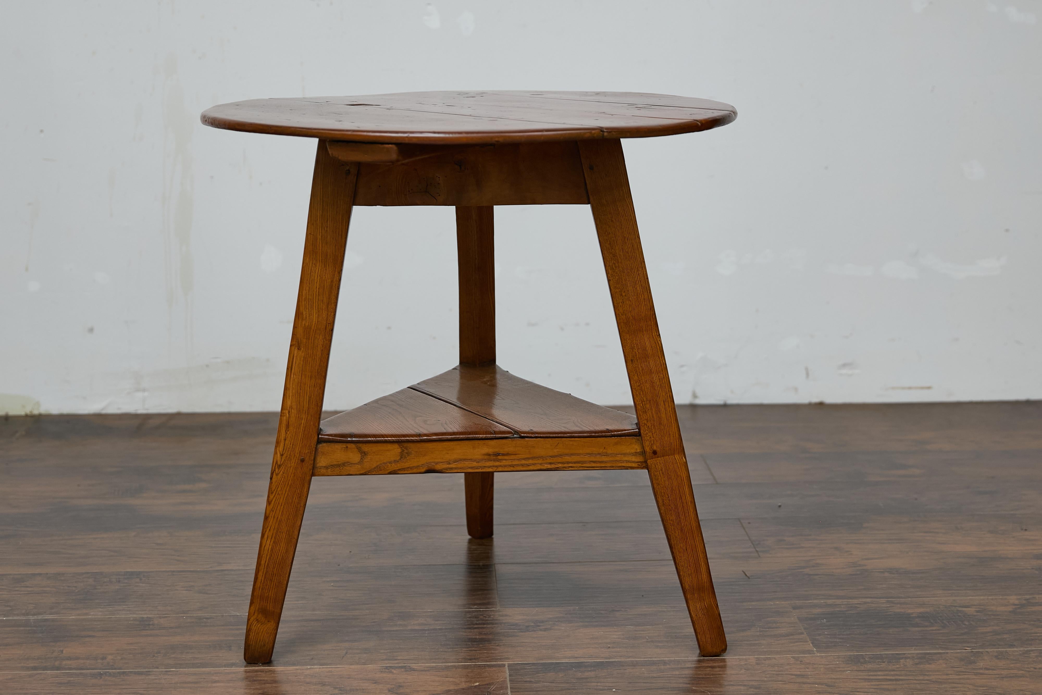 19th Century English Pine Cricket Table with Tripod Base, Round Top, and Shelf 5