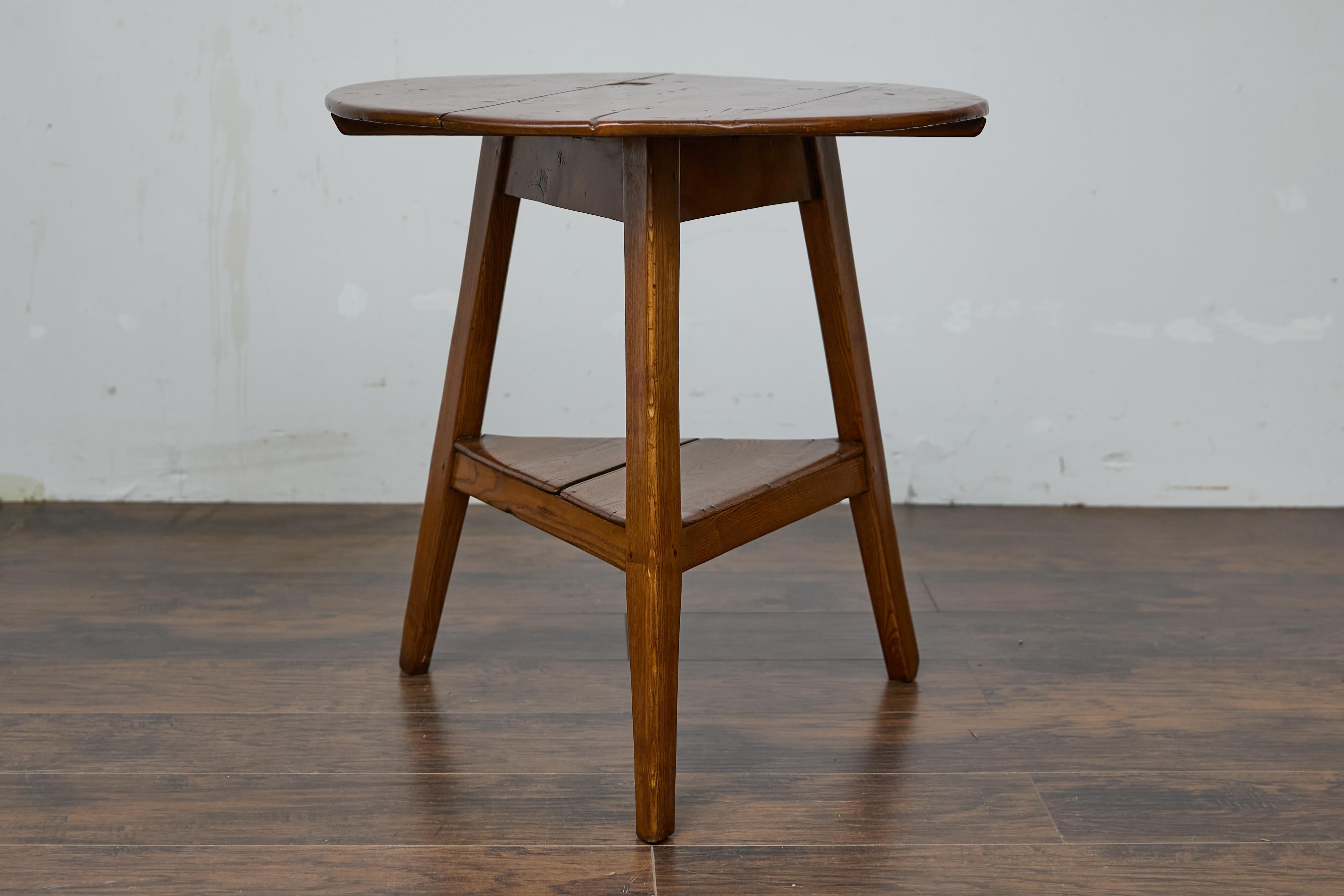 19th Century English Pine Cricket Table with Tripod Base, Round Top, and Shelf 6