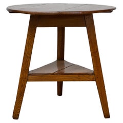 19th Century English Pine Cricket Table with Tripod Base, Round Top, and Shelf