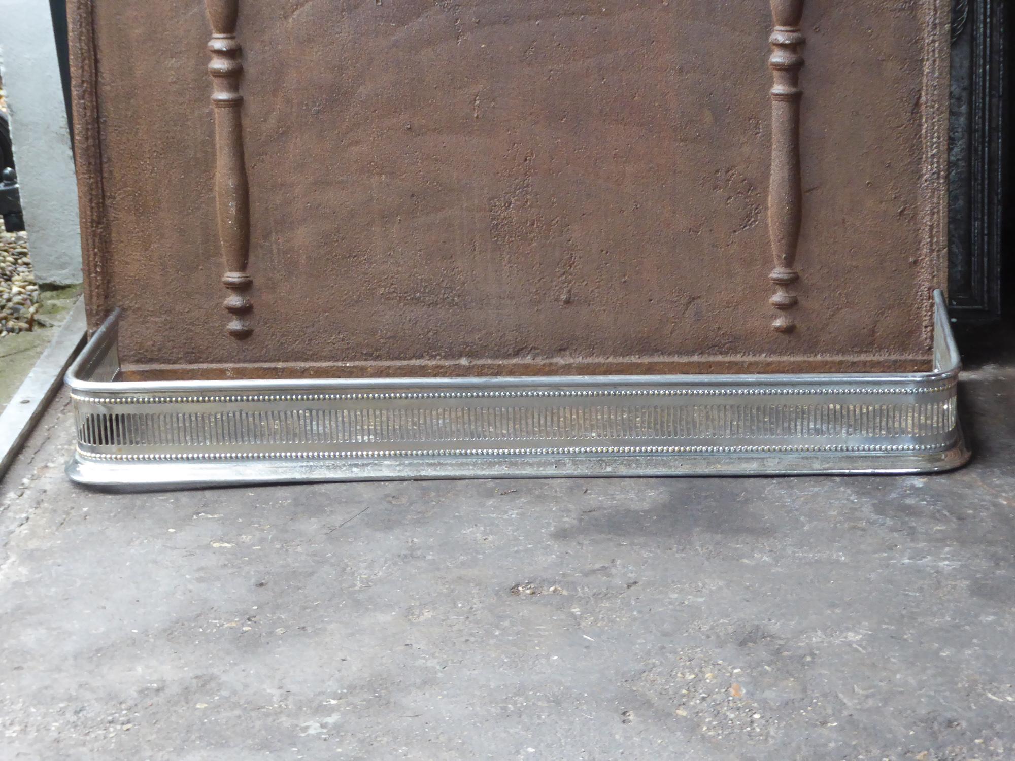Beautiful 19th century English Victorian fireplace fender. The fender is made of polished steel. The fender is in a good condition and is fully functional.
