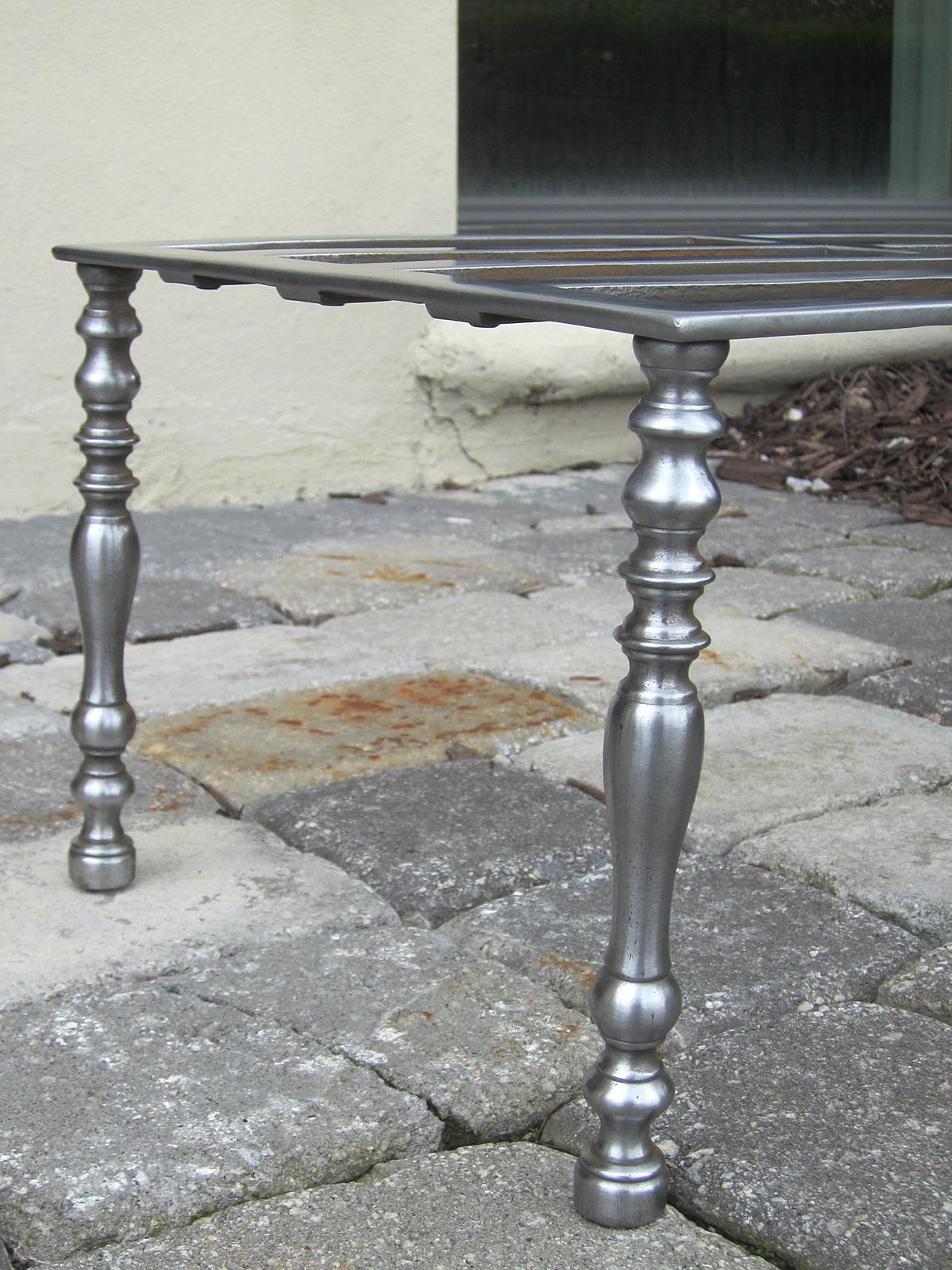 19th century English polished steel trivet.