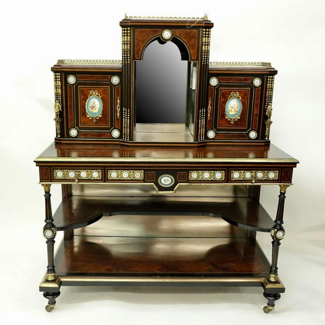 This is superb quality 19th century English cabinet with hand painted inset porcelain plaques, and gilt bronze mountings. Original finish.
Superb brass work of the highest quality, a.brass gallery to the top, and fashioned with burr walnut tops and