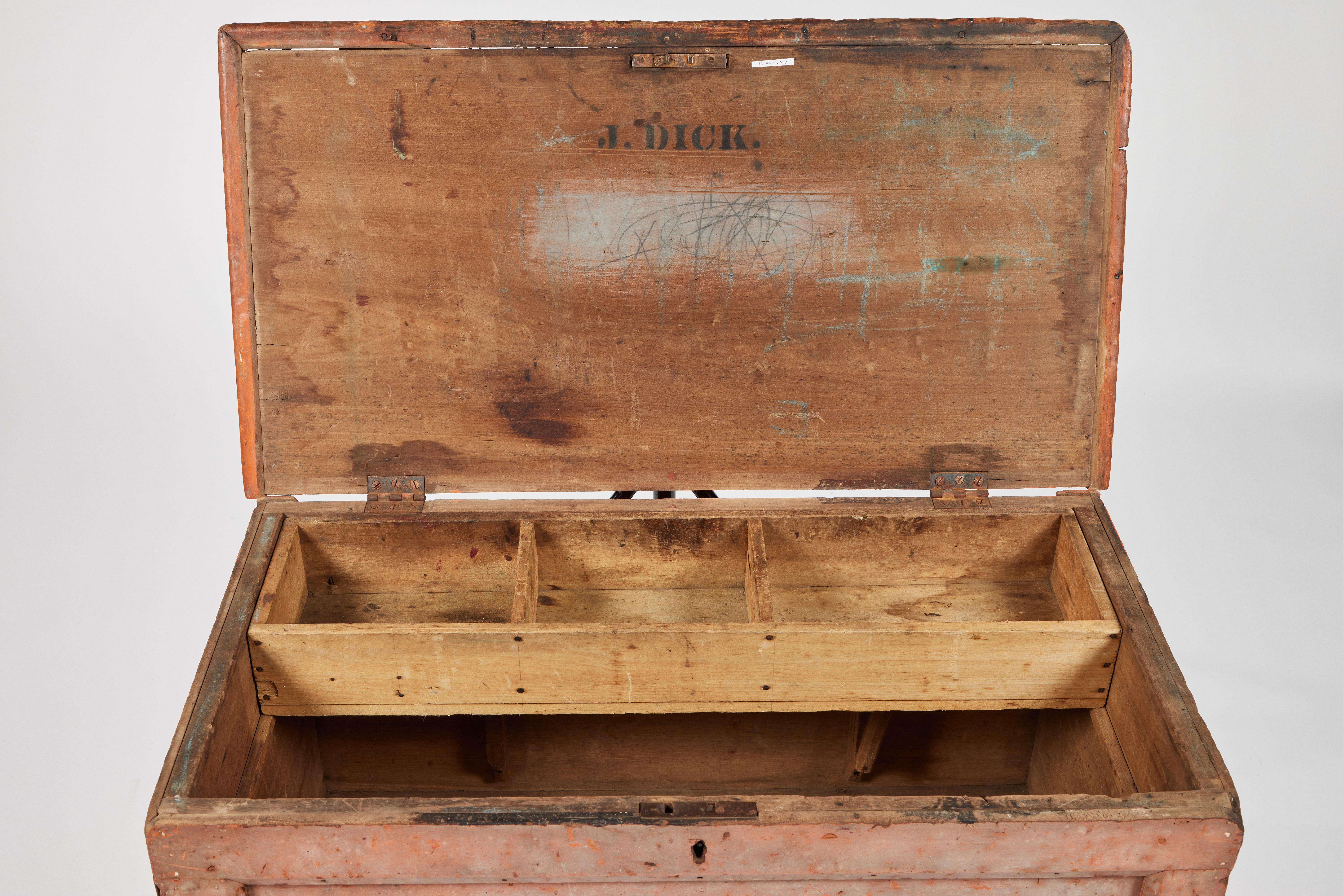 19th century English primitive trunk/blanket chest with original paint. The till, or candle tray, can be used to store smaller items, and there are some narrow compartments installed along the front interior. Underside of the lid is stamped, J.