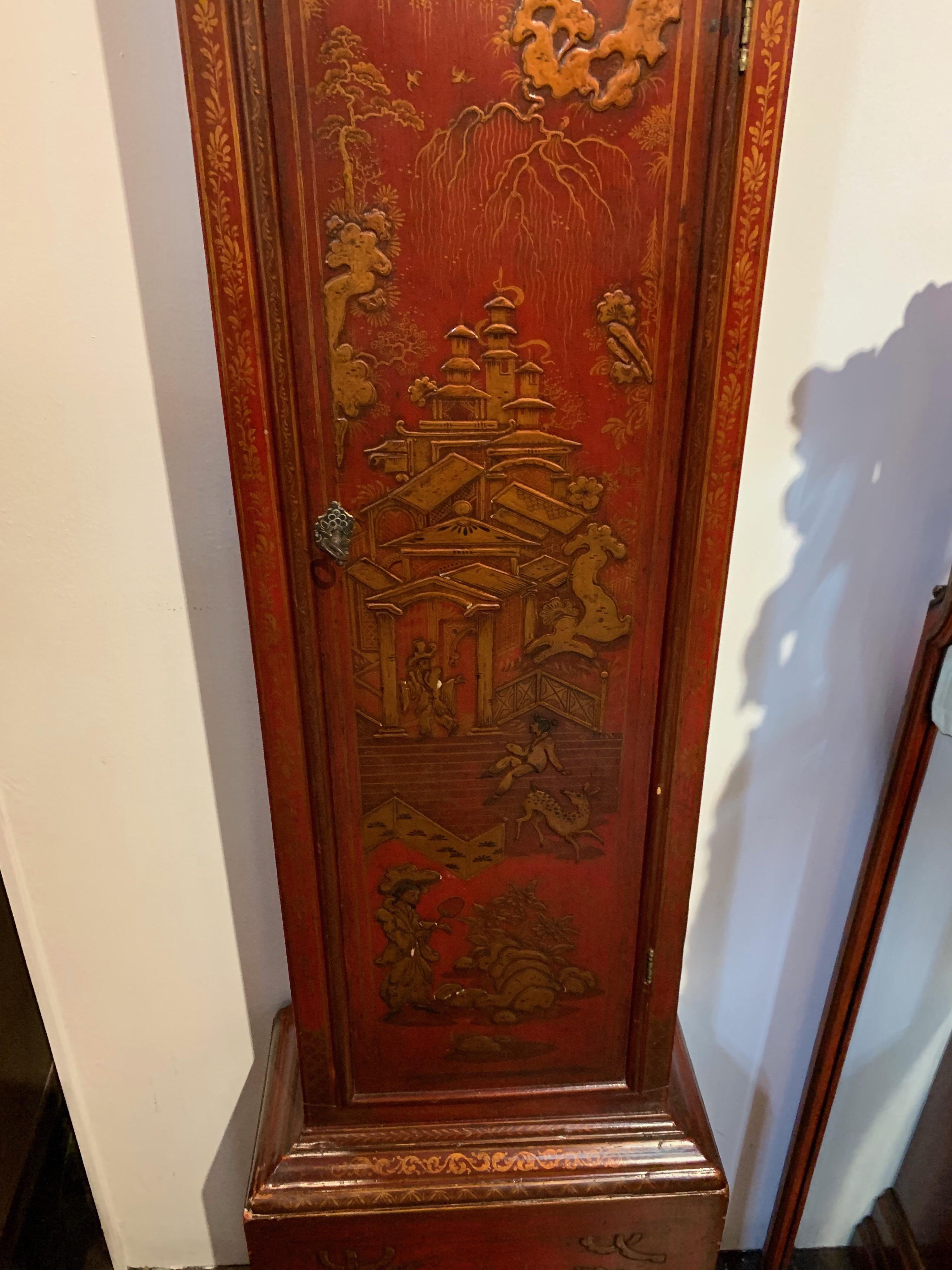 Beautiful 19th century red lacquered tall cased clock with chinoiserie design. The clock has London movement by George Tyler. A stunning piece!