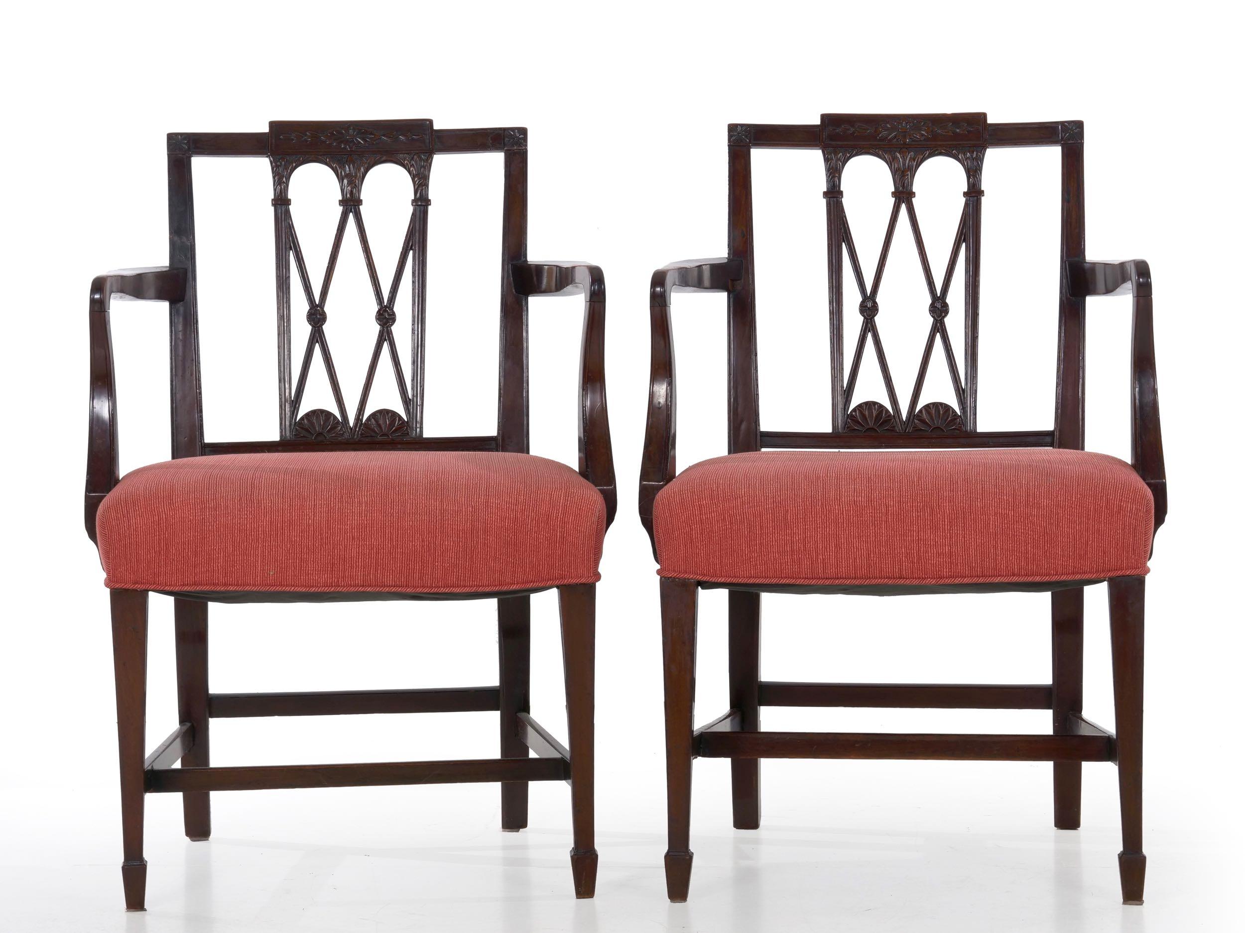 A beautiful early set of chairs, it is comprised of five period chairs and three very careful and convincing replicas from the early part of the 20th century. Each is executed in a dense mahogany with a ruby-cognac finish that has delightfully worn