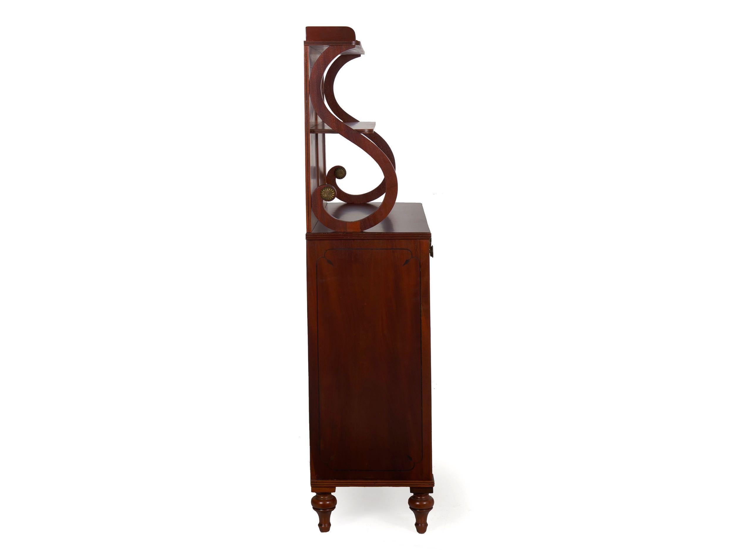 Regency mahogany brass-mounted chiffonier,
England, 19th century
Item # 902XFP09P 

With a diminutive form and tidy lines, this little Regency era chiffonier is the ideal size and proportion for today's home. Projecting only 14