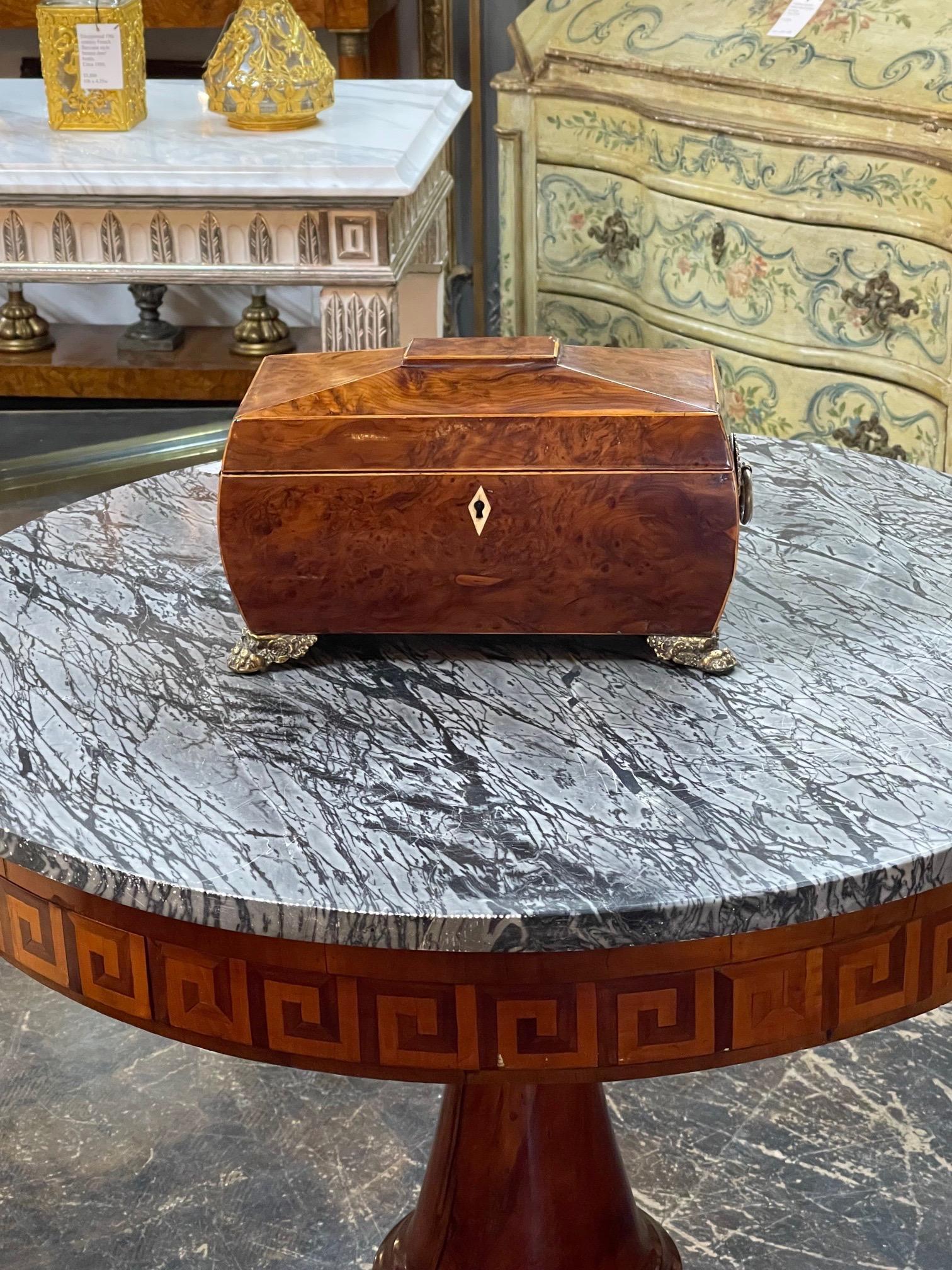 Very fine 19th century English Regency tea caddy. Made of beautiful Burl Walnut with lots of compartments. A great accessory!