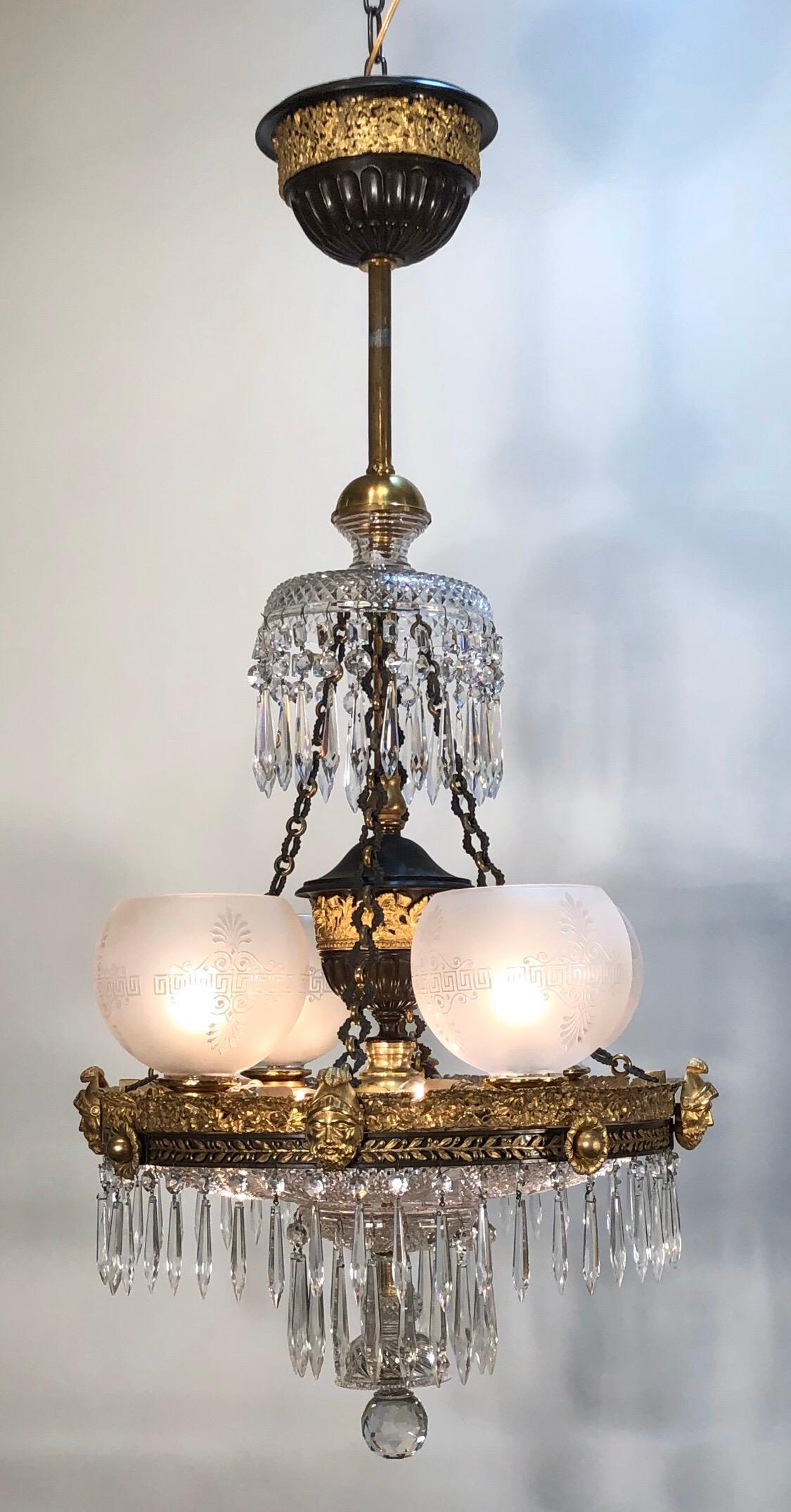 An exceptionally fine early 19th century English Regency crystal and bronze gasolier, originally an Argand / Colza chandelier. This Colza chandelier is labelled by noted maker Johnston Brookes & Co. This impressive argand / colza chandelier was