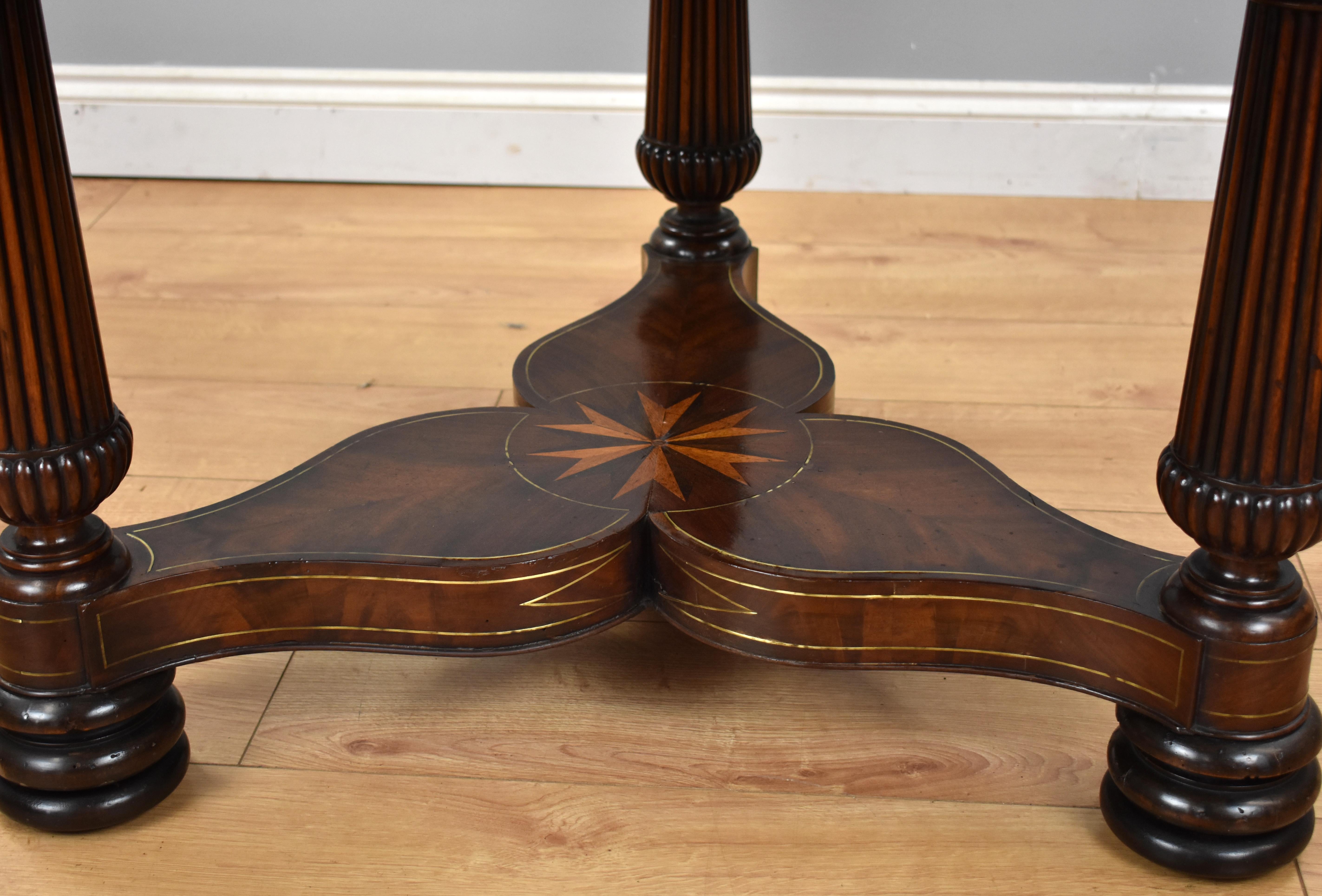 19th Century English Regency Flame Mahogany Brass Inlaid Drum Table For Sale 10