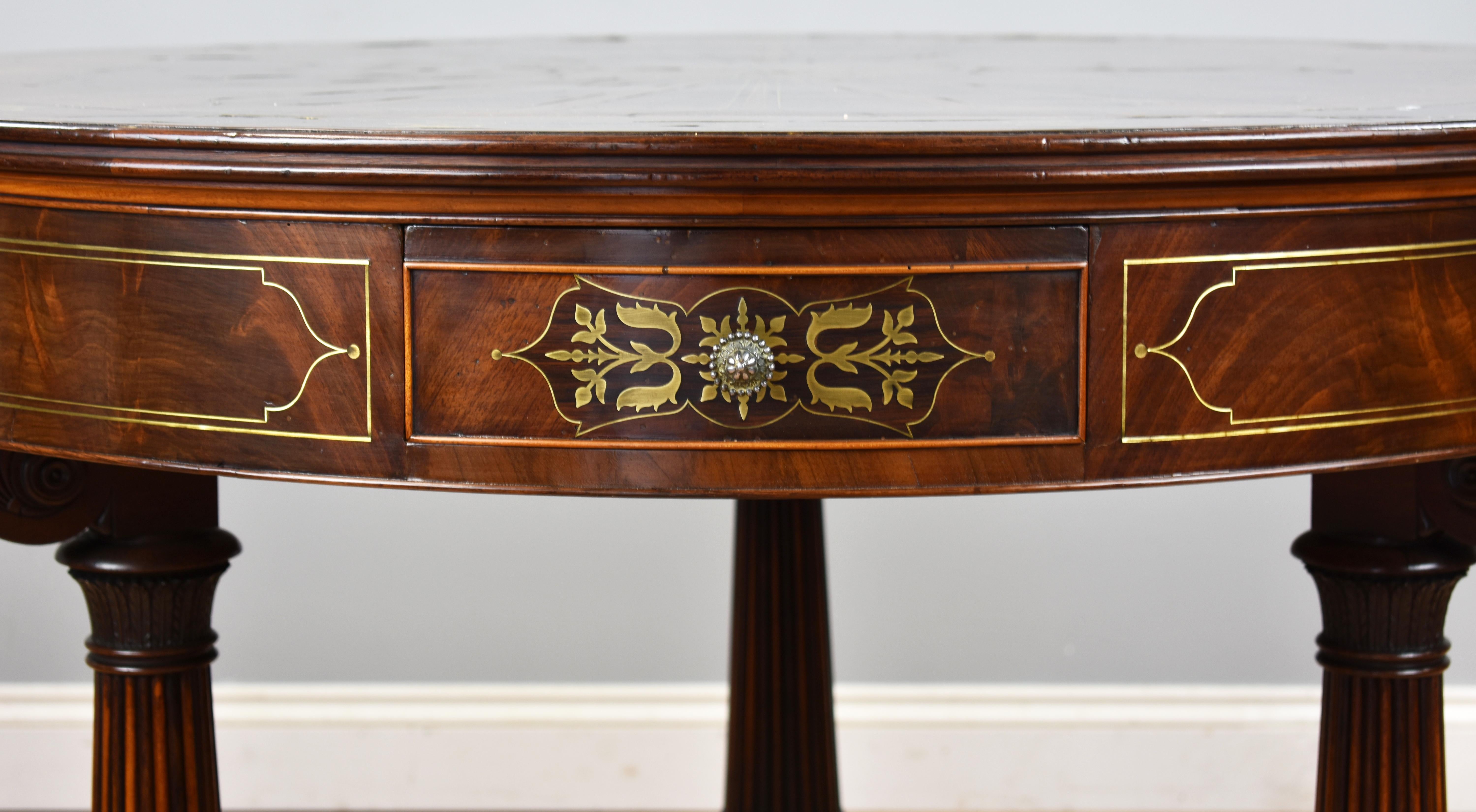 19th Century English Regency Flame Mahogany Brass Inlaid Drum Table In Good Condition For Sale In Chelmsford, Essex