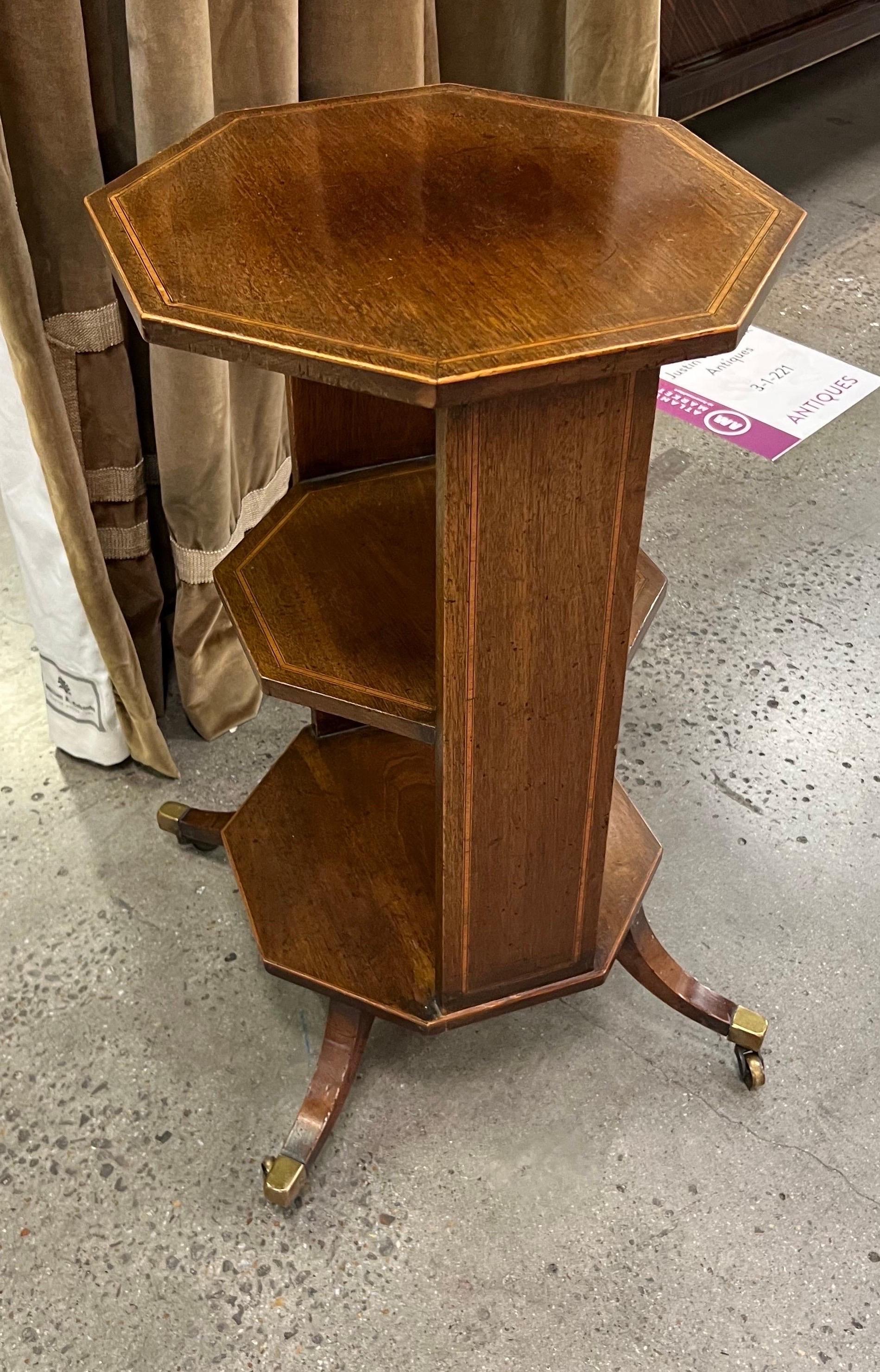 Charming little 19th century English regency inlaid mahogany side table with open shelves.