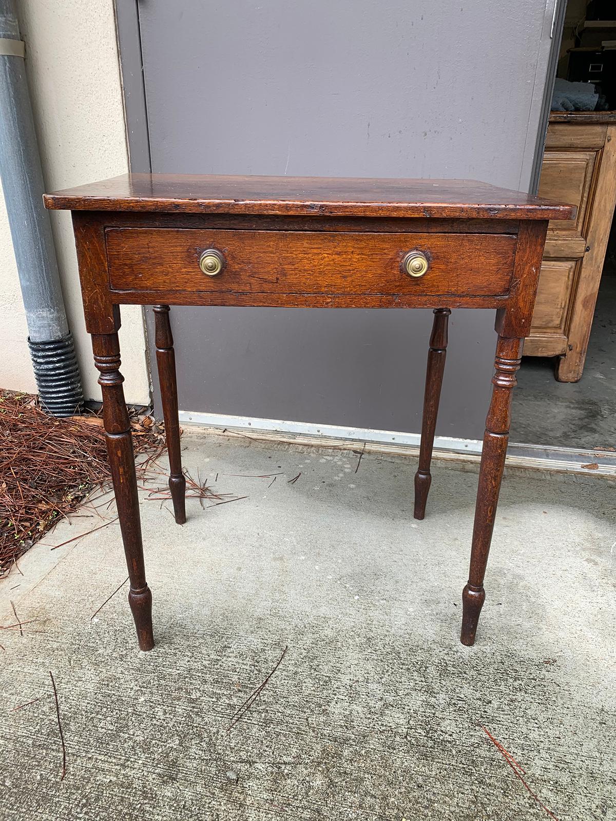 19th century English Regency oak table with one drawer.