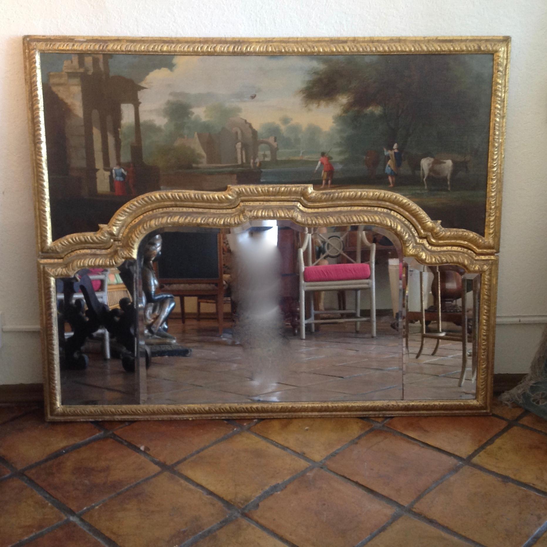 Beautifully painted with multiple figures and finely detailed giltwood frame.
Each of the inset mirrors is bevelled.