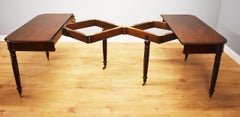 19th Century English Regency Period Mahogany Accordion Dining Table