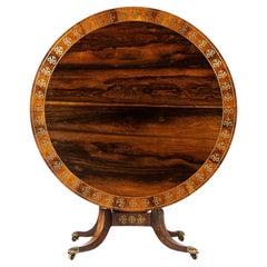 Mesa de centro de palisandro de la Regencia inglesa del siglo XIX