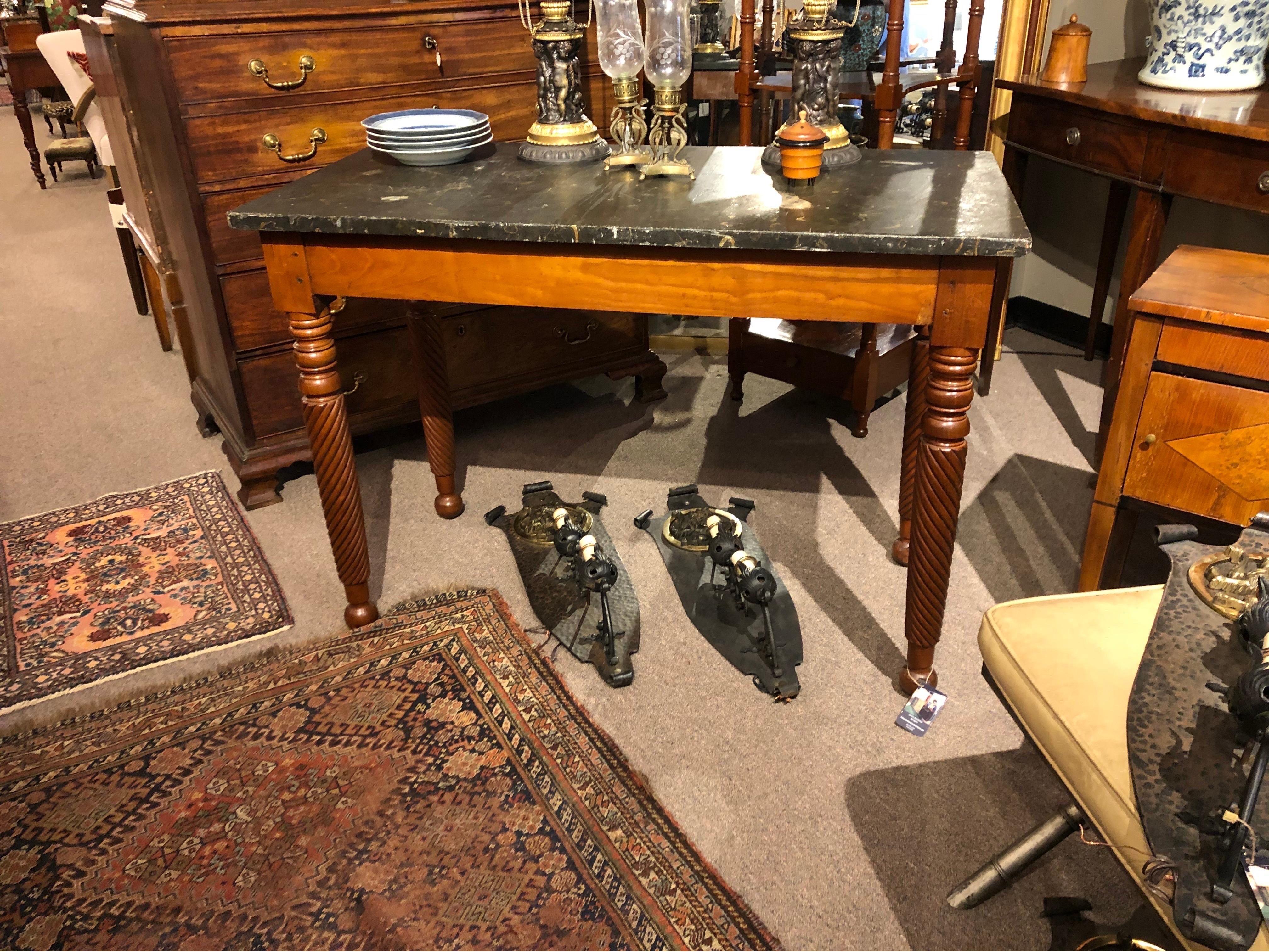Great 19th century English Regency slate top mahogany mixing table. Base is double pinned construction with hand carved spirals between ring turnings and ball feet. Top is hand chiseled slate with an incredible faux painted finish. Wonderful piece-