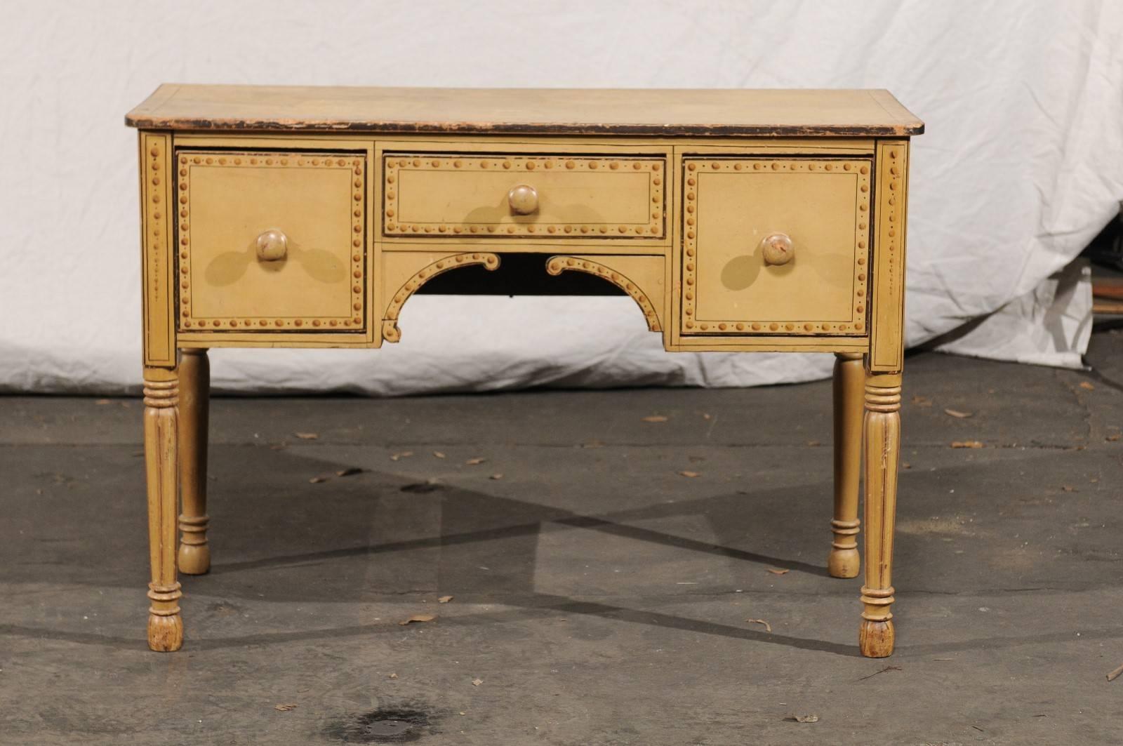 19th century English Regency style cream painted table with drawers, great surface decoration.