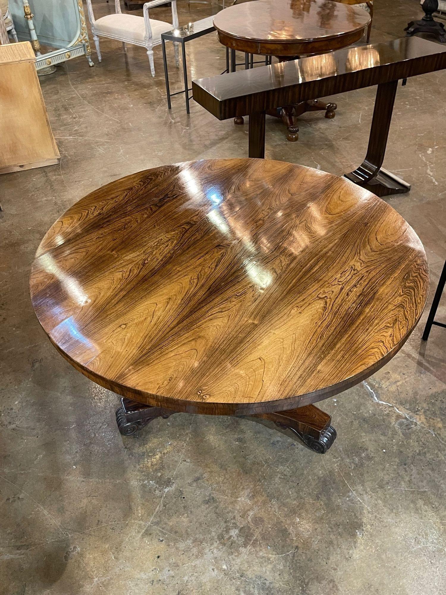 Very fine 19th century English Regency style Rosewood center table. This piece has a gorgeous polished finish. A super elegant table!