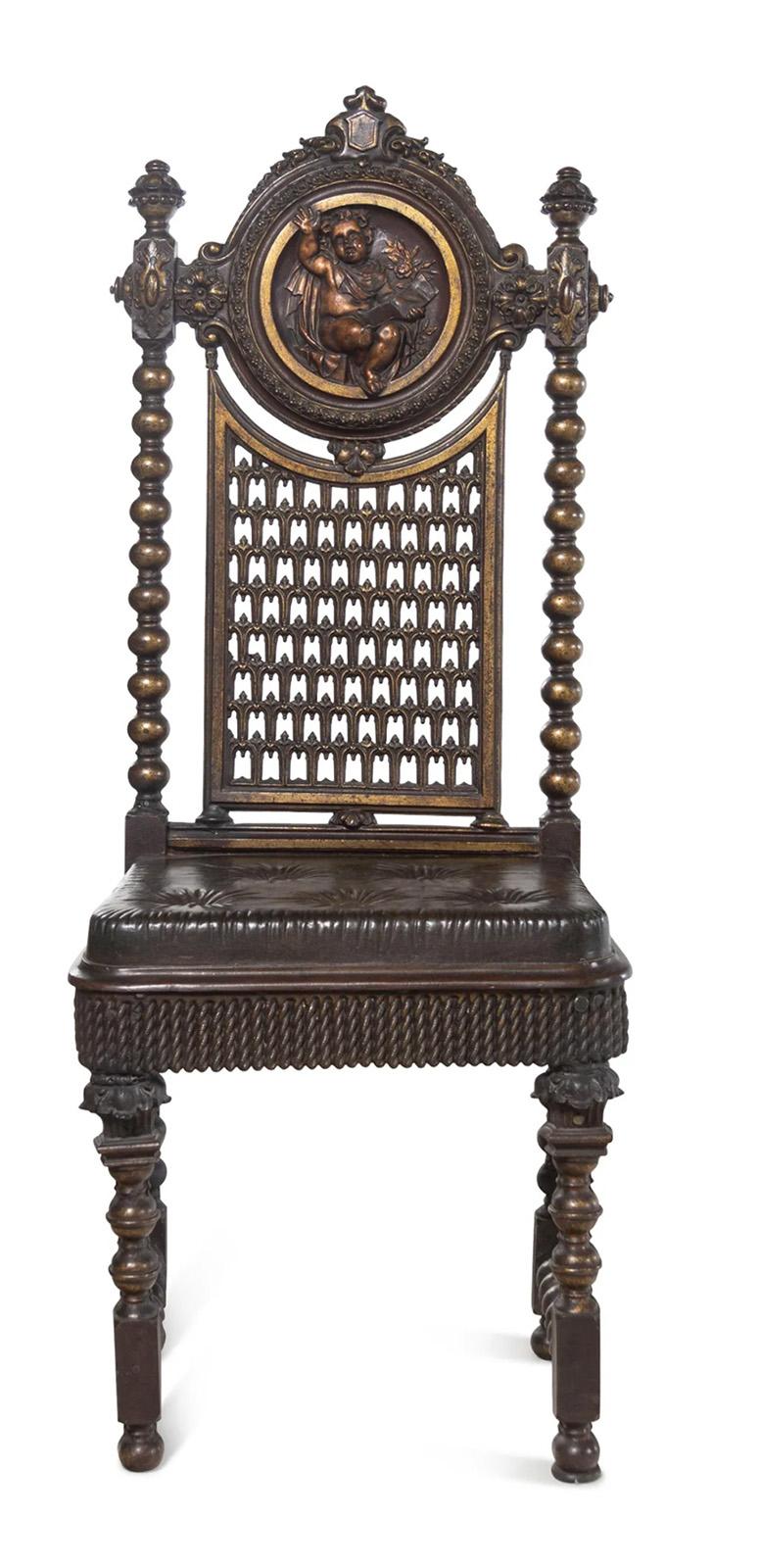 A 19th century Renaissance Revival bronzed metal chair after the style of Christopher Dresser. 

Dimensions: 49.75