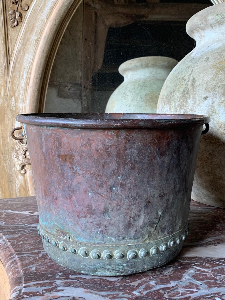 A lovely 19th century English riveted copper planter with a nice natural verdigris.