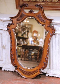 19th Century English Rococo Carved Walnut Wall Mirror with Beveled Glass