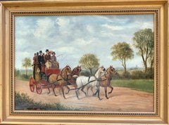 19th century Victorian English mail coach with horses in a landscape