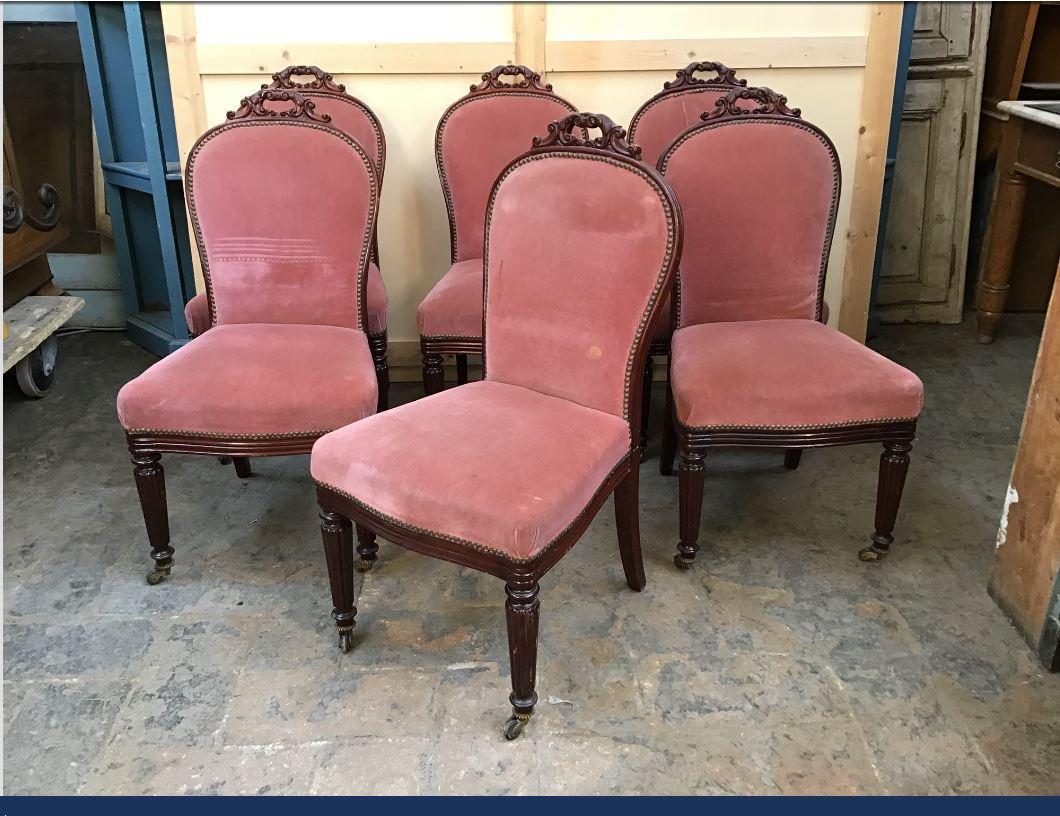 19th century English set of 6 mahogany chairs with wheels and original red velvet upholstery, 1890s.
