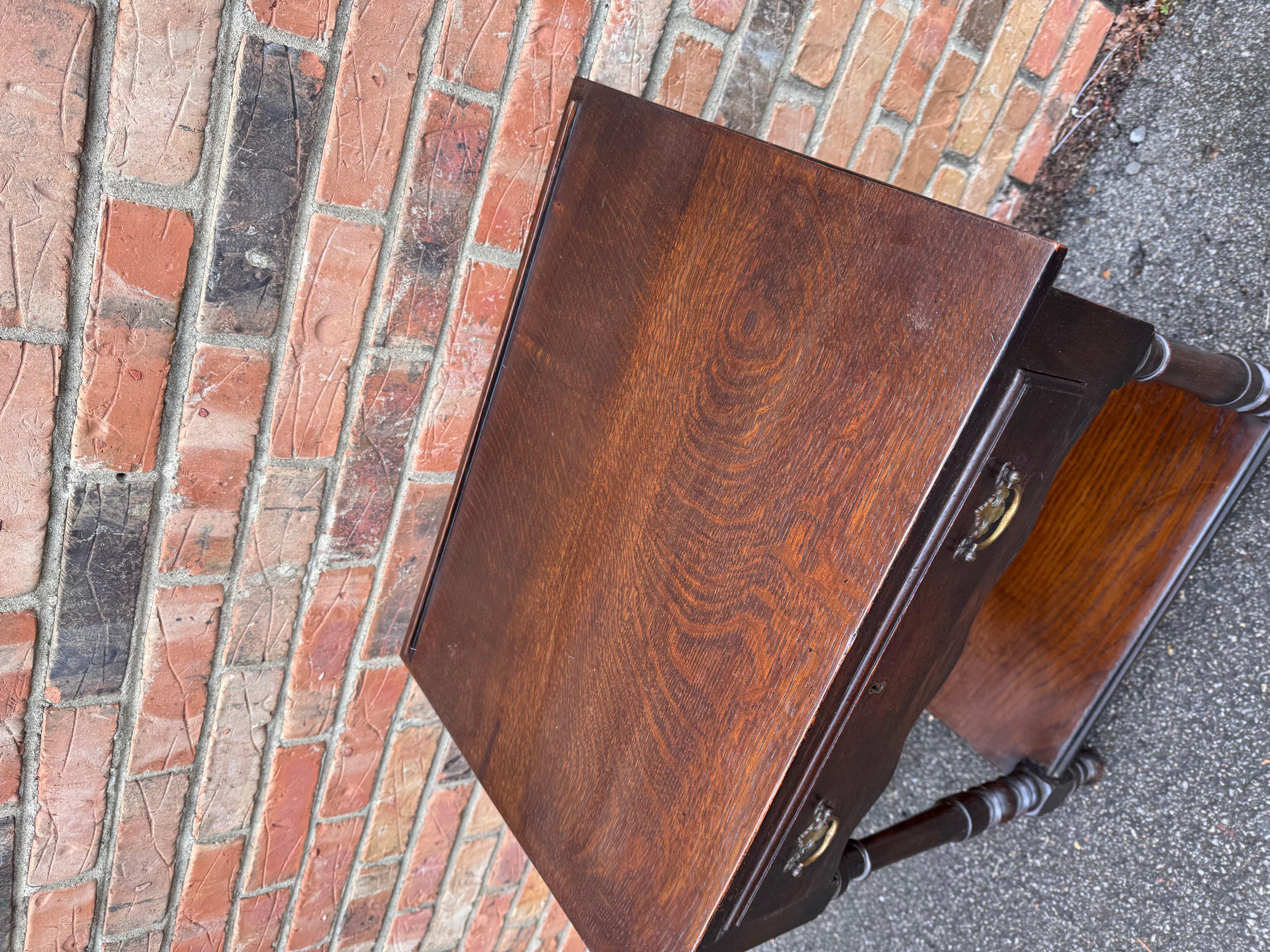 This is a beautiful 19th century English side table. The simple yet beautiful design of this table makes it a great transitional piece. It is made from oak that shows the original color and patina notice the hand forged nails attaching the top.A