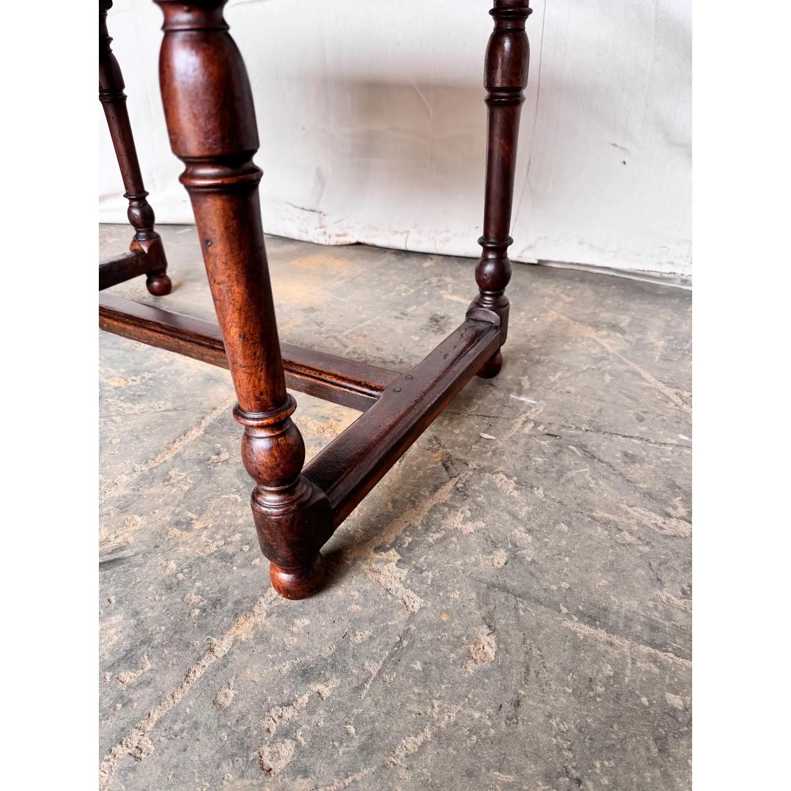 This is a gorgeous 19th century side table. This piece came from England, and its patina and character are amazing. Even down to the legs there is little details of natural beauty that make this table stunning. The nicly turned legs and the delicate