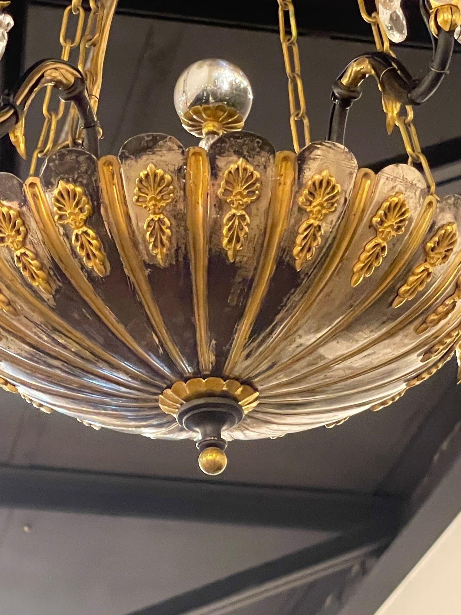 Very fine 19th century English silver and bronze 7 light chandelier. This fixture has a beautiful decorative design and lovely curved arms along with crystals on the lights and at the top. A decorative chandelier that adds a real touch of class!