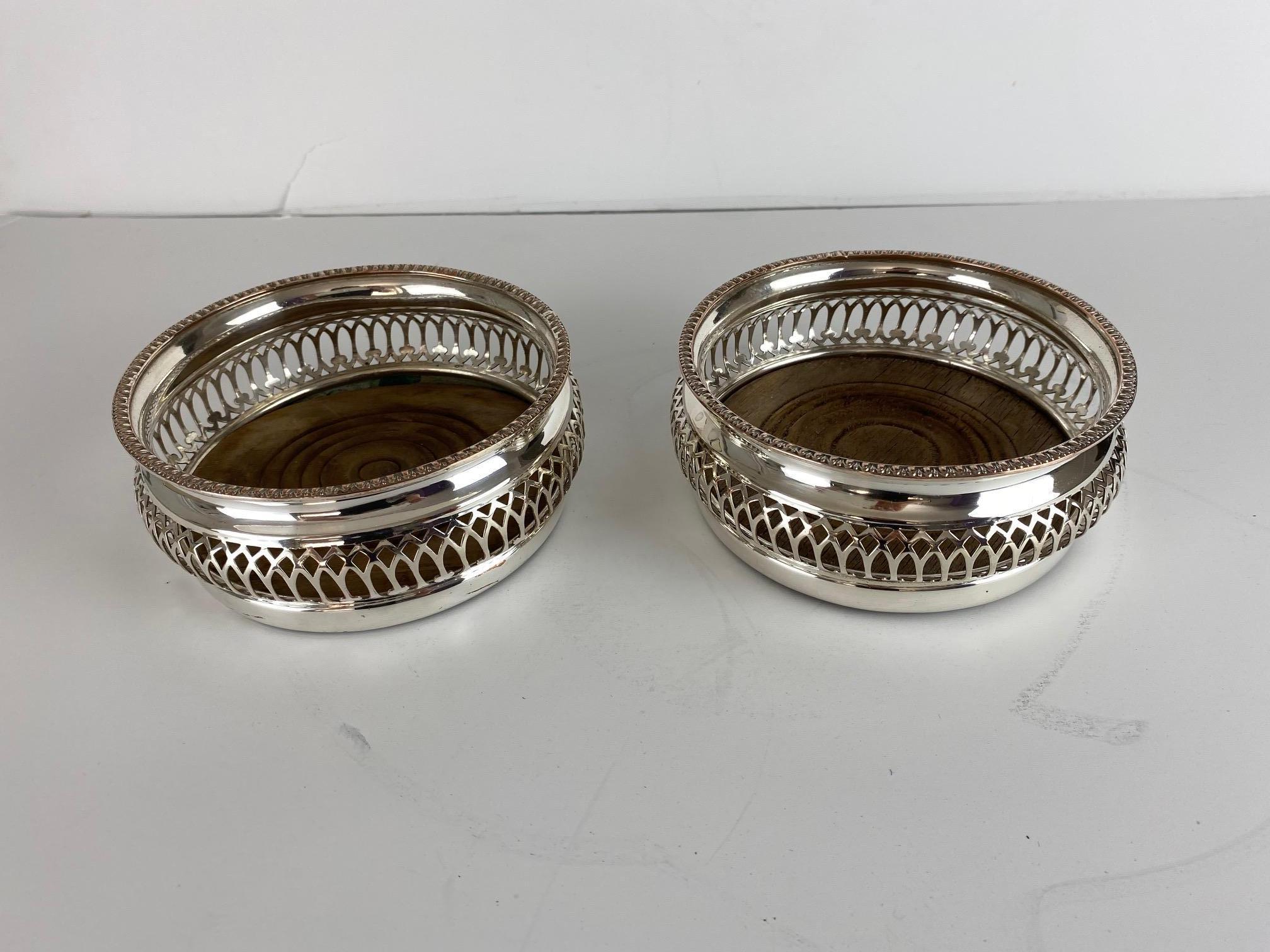 A pair of 19th century English silver-plated coasters circa 1850s.