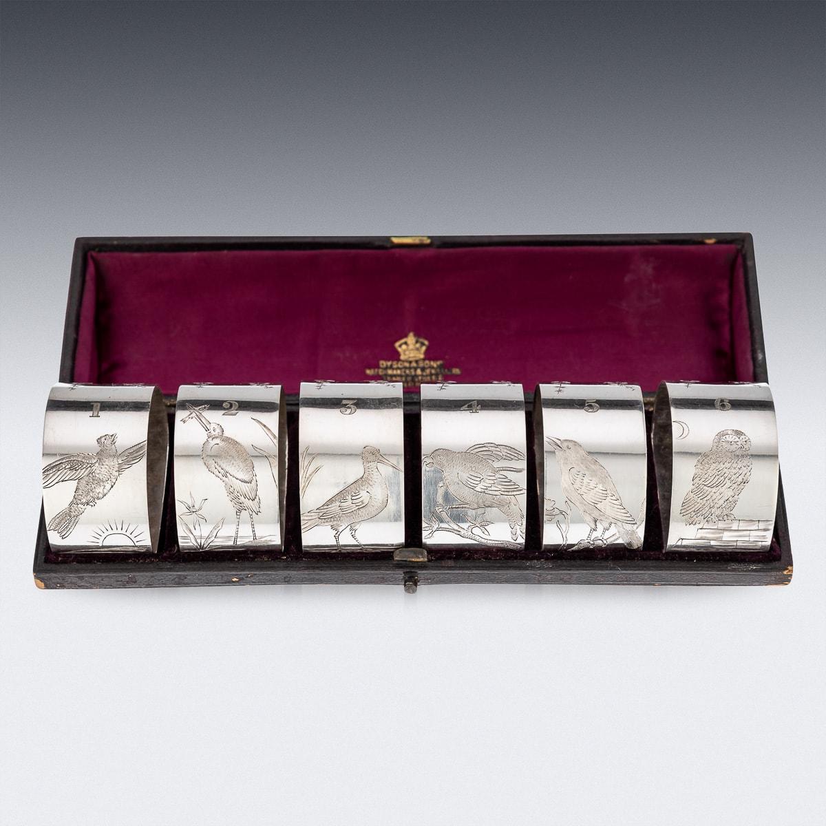  Antique 19th Century Victorian stunning set of six silver plated napkin holders and butt markers. Each napkin holder is engraved with highly-decorative flowers and birds in the oriental Japanise inspired style. The set comes in an original leather
