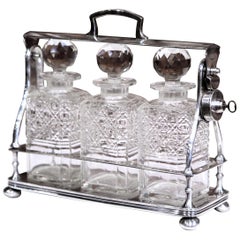 19th Century English Silver Plated Three-Carafe Bar Tantalus with Lock Mechanism