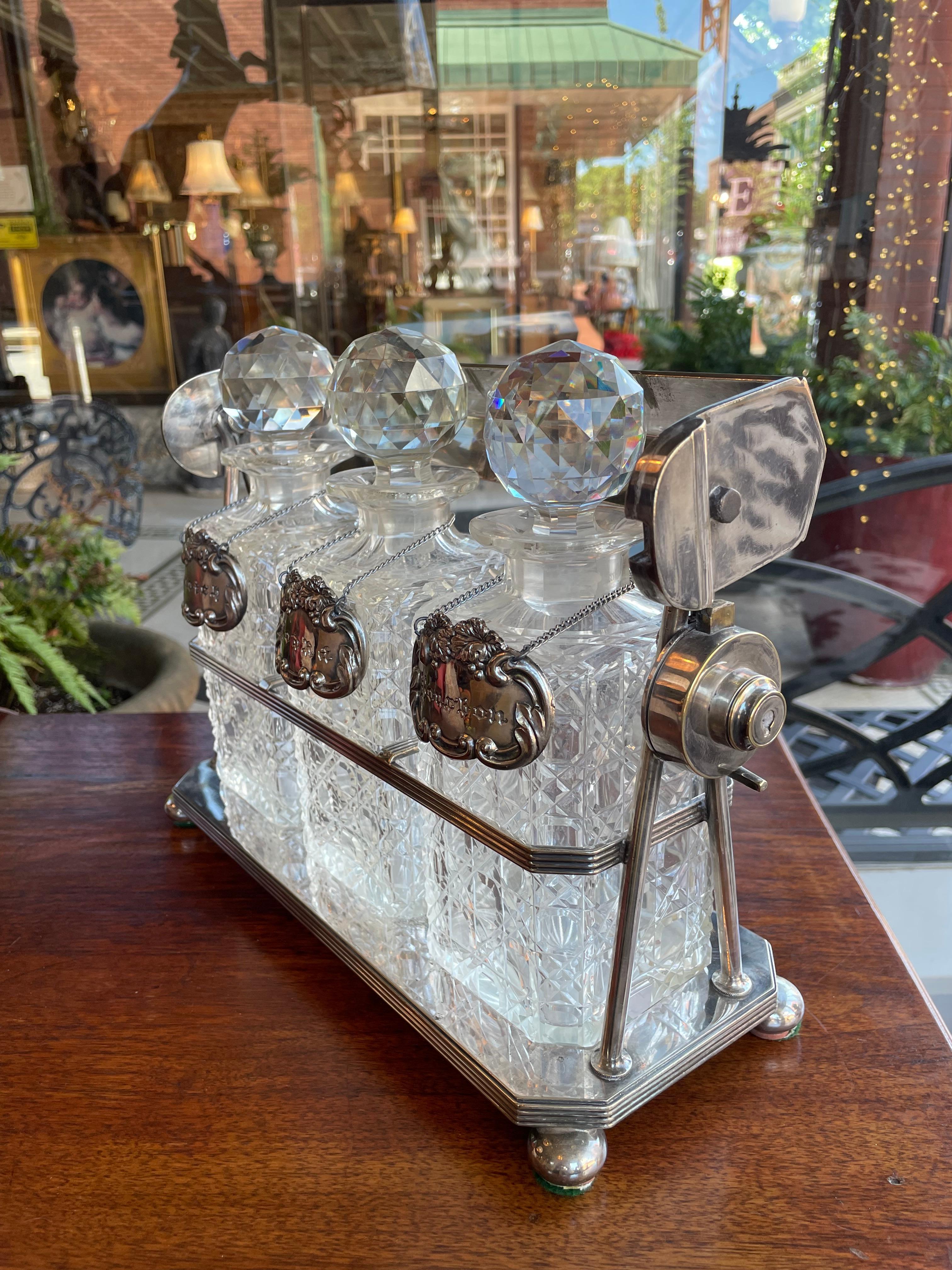 19th Century English Silver Plated Three Carafe Tantalus with Lock Mechanism In Good Condition For Sale In Greer, SC