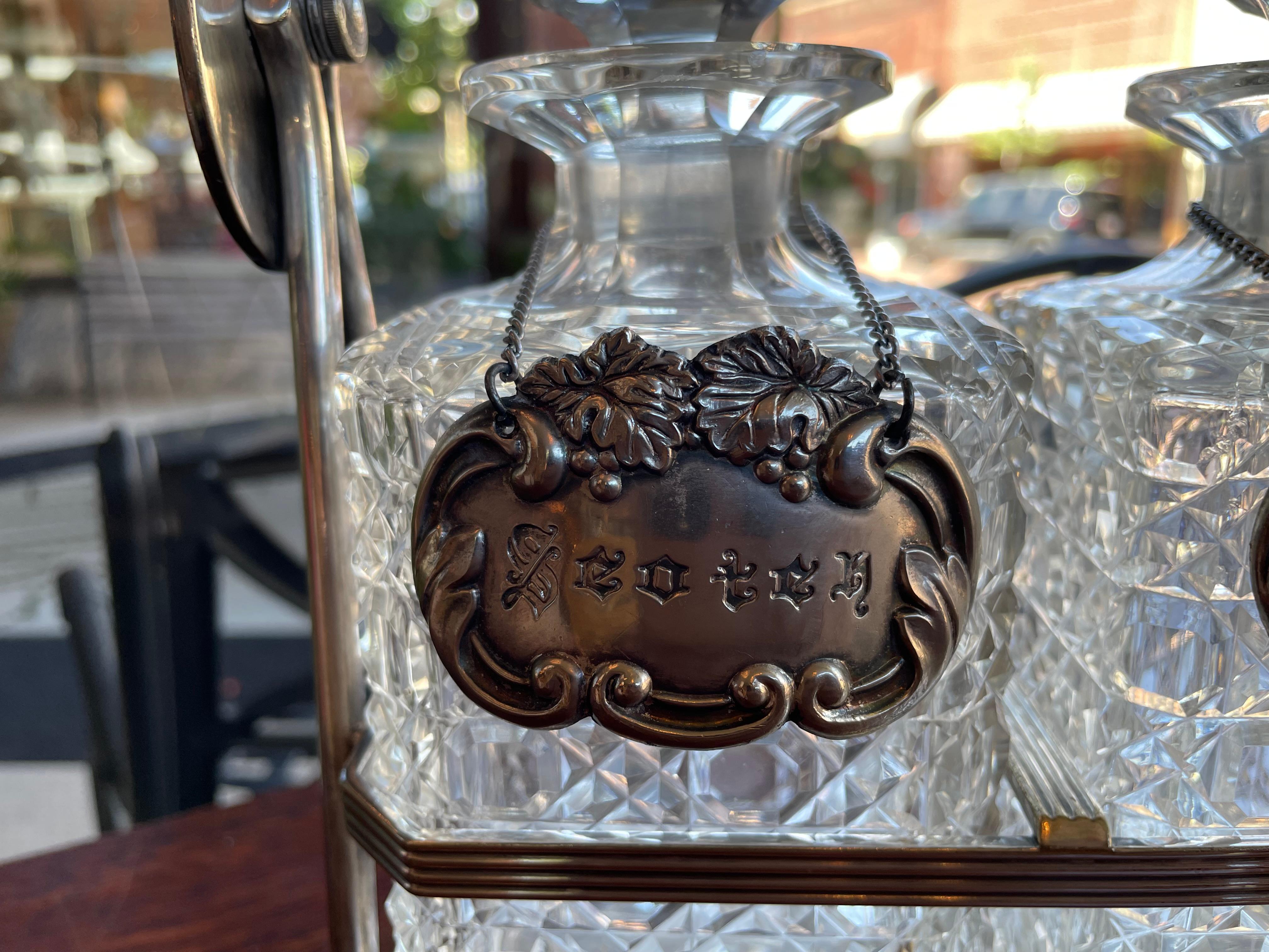 19th Century English Silver Plated Three Carafe Tantalus with Lock Mechanism For Sale 4