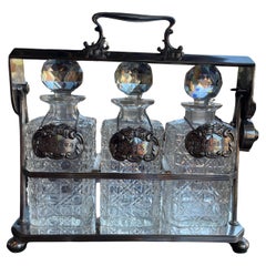 Antique 19th Century English Silver Plated Three Carafe Tantalus with Lock Mechanism
