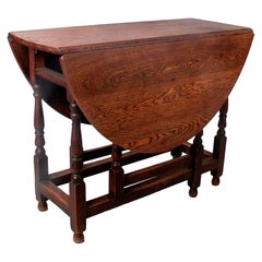 19th Century English Spindle Leg Winged Wooden Table