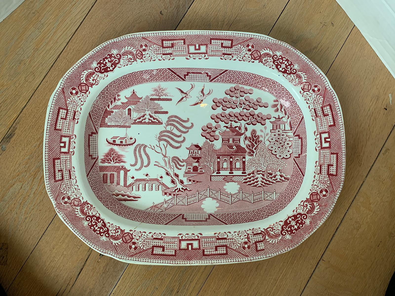 19th century English Staffordshire pink/red and white Willow pattern transfer earthenware oval pottery charger or meat platter by Davenport, Marked.