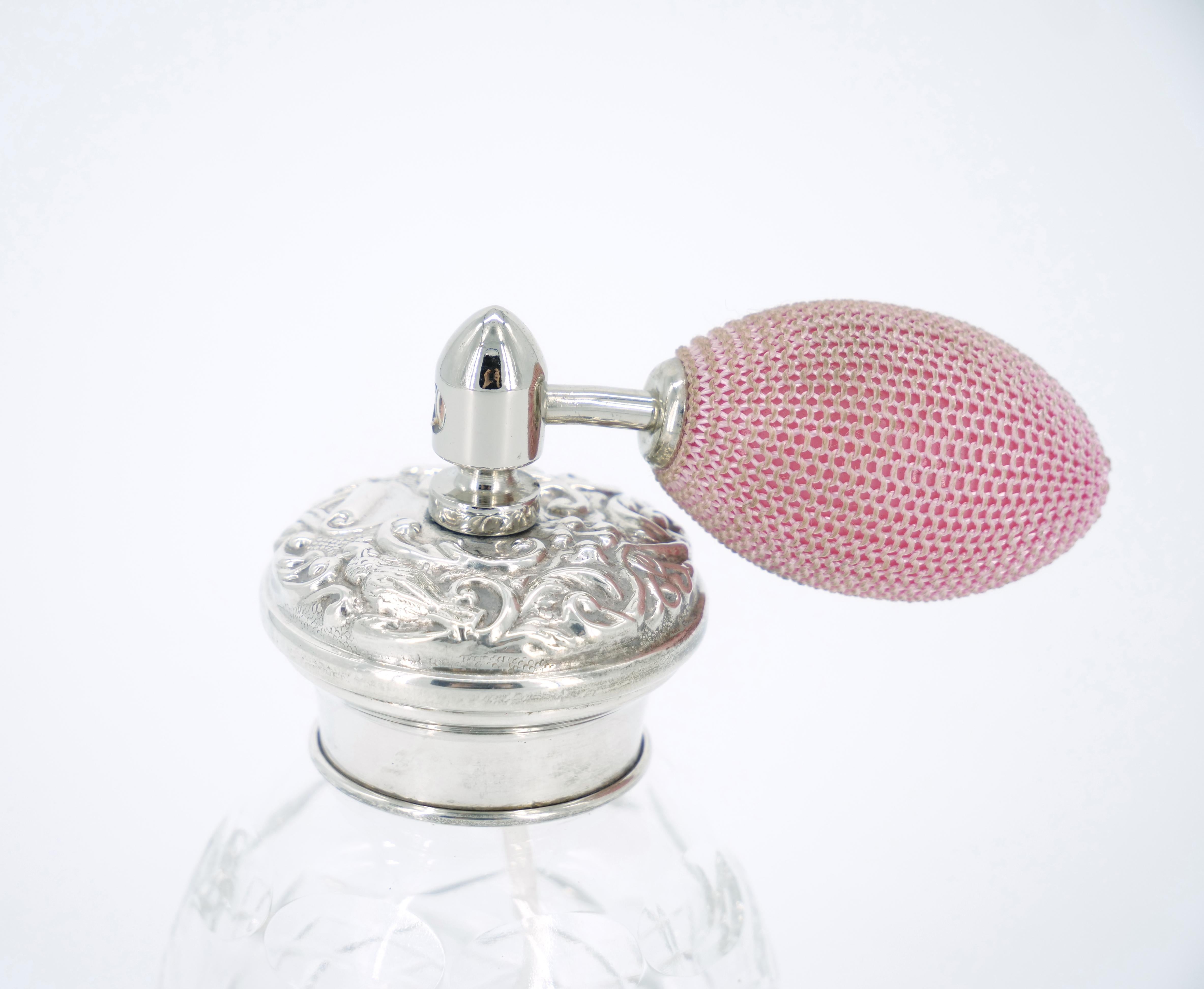 perfume bottle with puff
