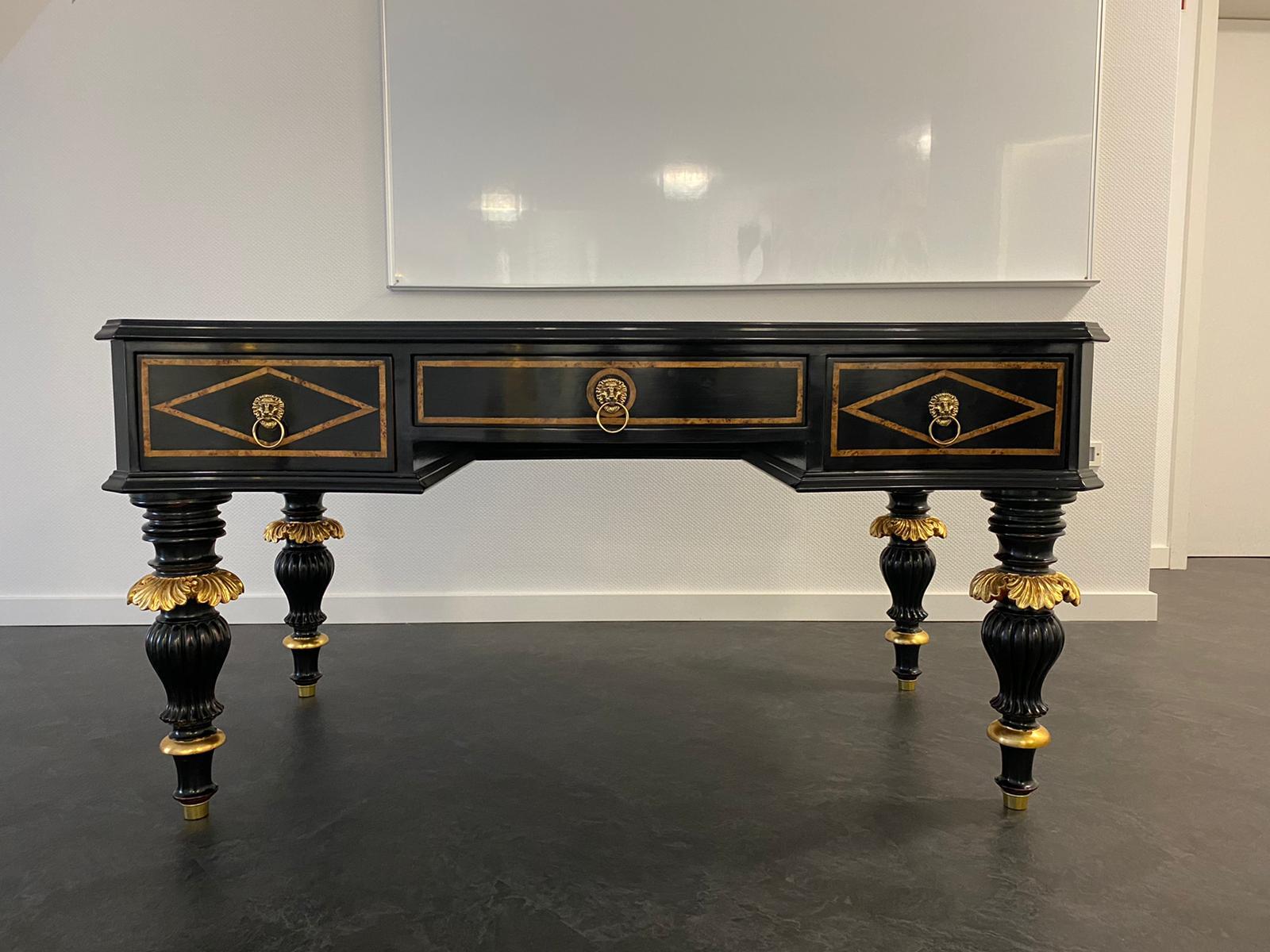 Solid softwood and beech with thread inlays. Partly ebonized and gilded. Heavily cambered, four-sided passively curved, five-tier frame with a wide knee compartment on finely carved baluster-shaped legs ending in sabots. Slightly protruding, from